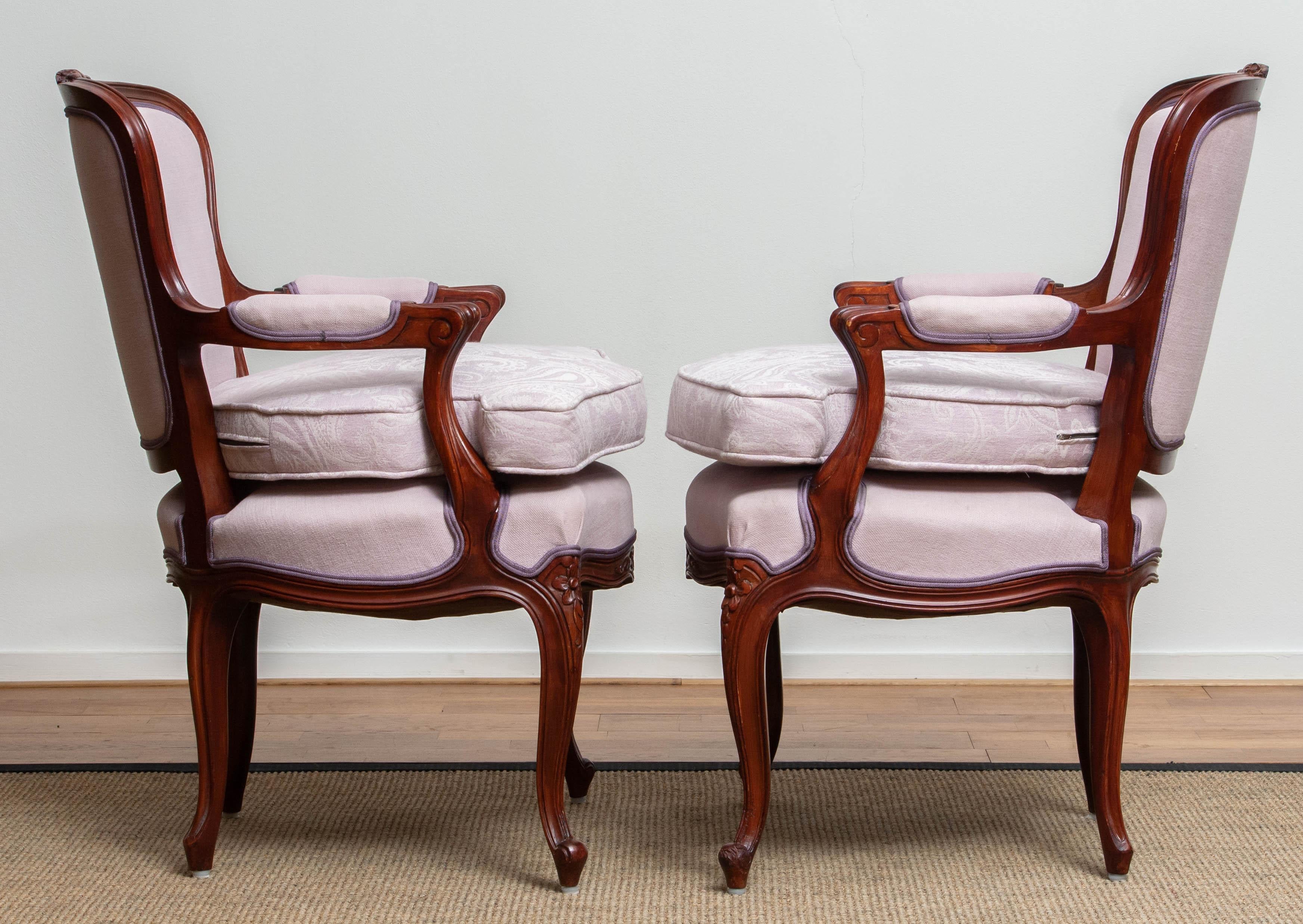 1950s, the Swedish neo-Rococo, and finished in the shabby chic technique armchair is in perfect condition. Upholstered in pink fabric and an extra cushion for extra comfort also in pink jacquard. Seat height with the extra cushion is: 21.20 inches