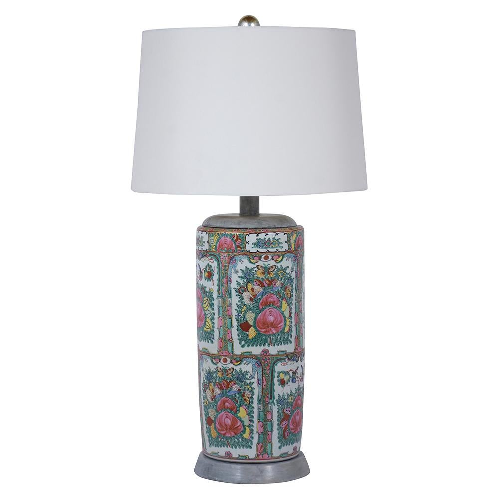 Introducing an extraordinary pair of Chinese table lamps, skillfully made from porcelain and in great condition. Each lamp features stunning, colorful decorative gilt designs, depicting intricate depictions of flowers, birds, and detailed patterns.