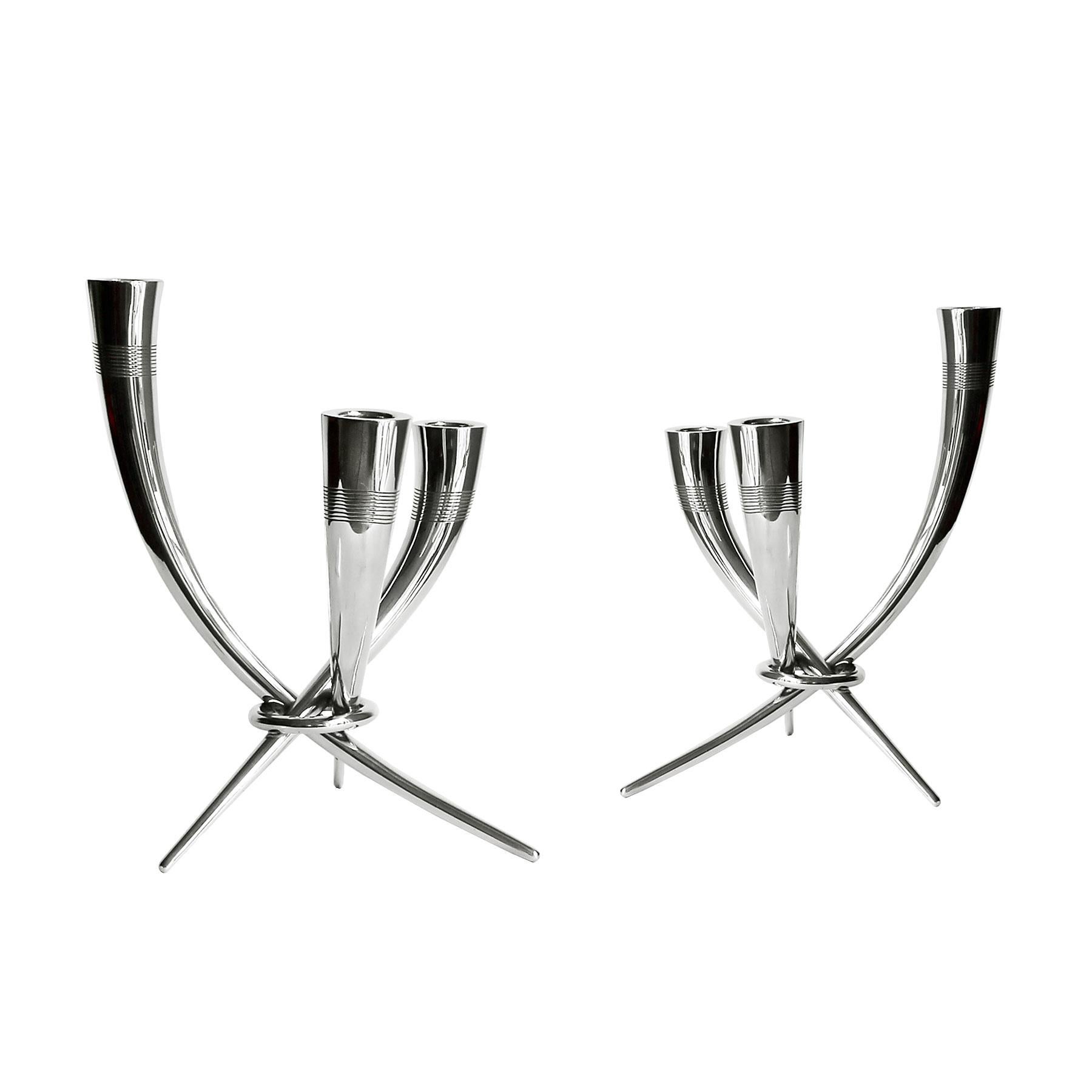 Pair of candelabrum, sterling silver, three branches, strips decoration on top.
Stamps: 