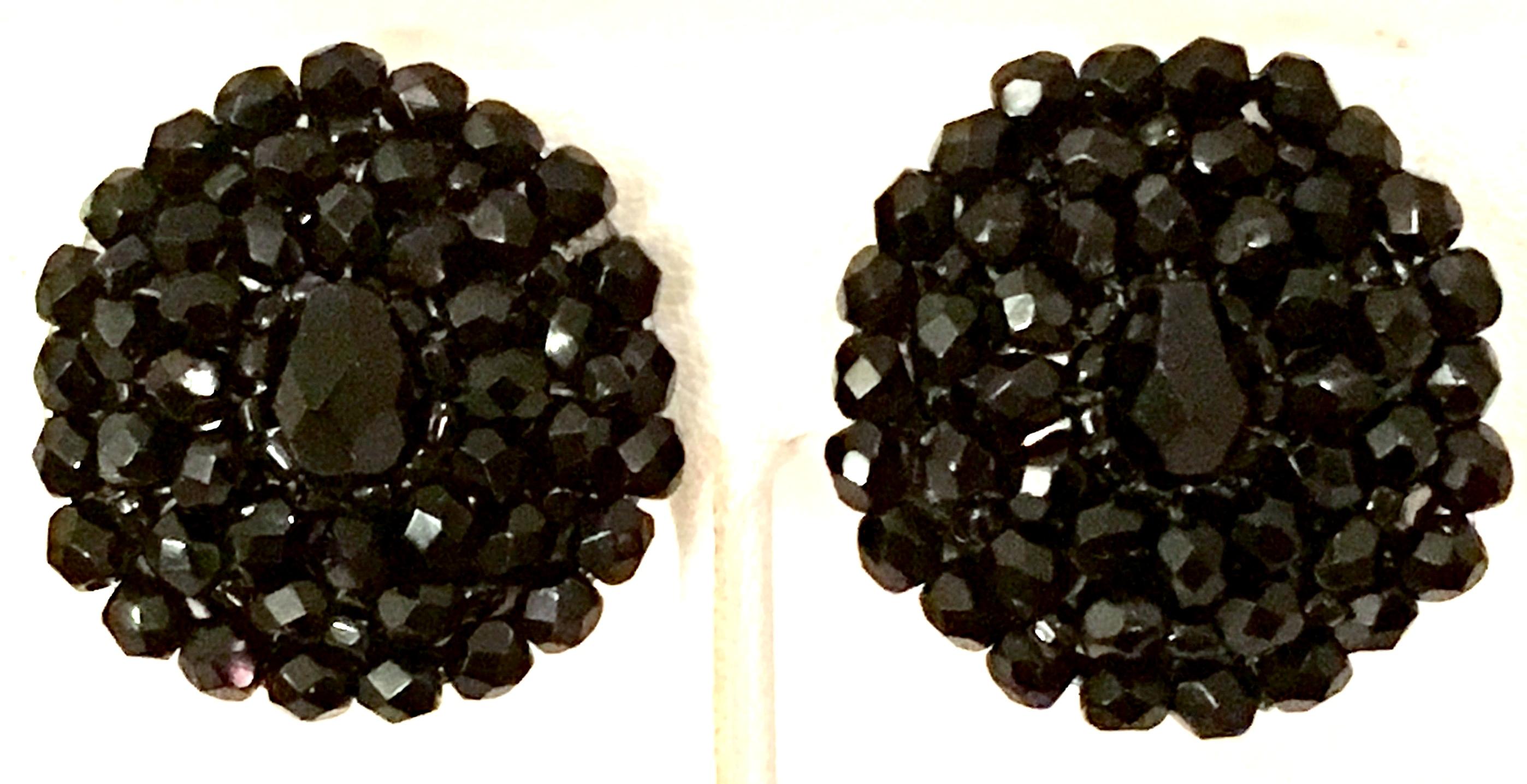 1950'S Pair Of Silver & Jet Black Brilliant cut and faceted art glass bead clip style earrings. Mounted on silver tone metal. 