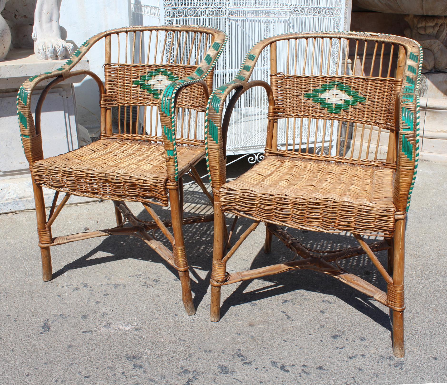1950s pair of Spanish lace wicker, wood and bamboo armchairs.