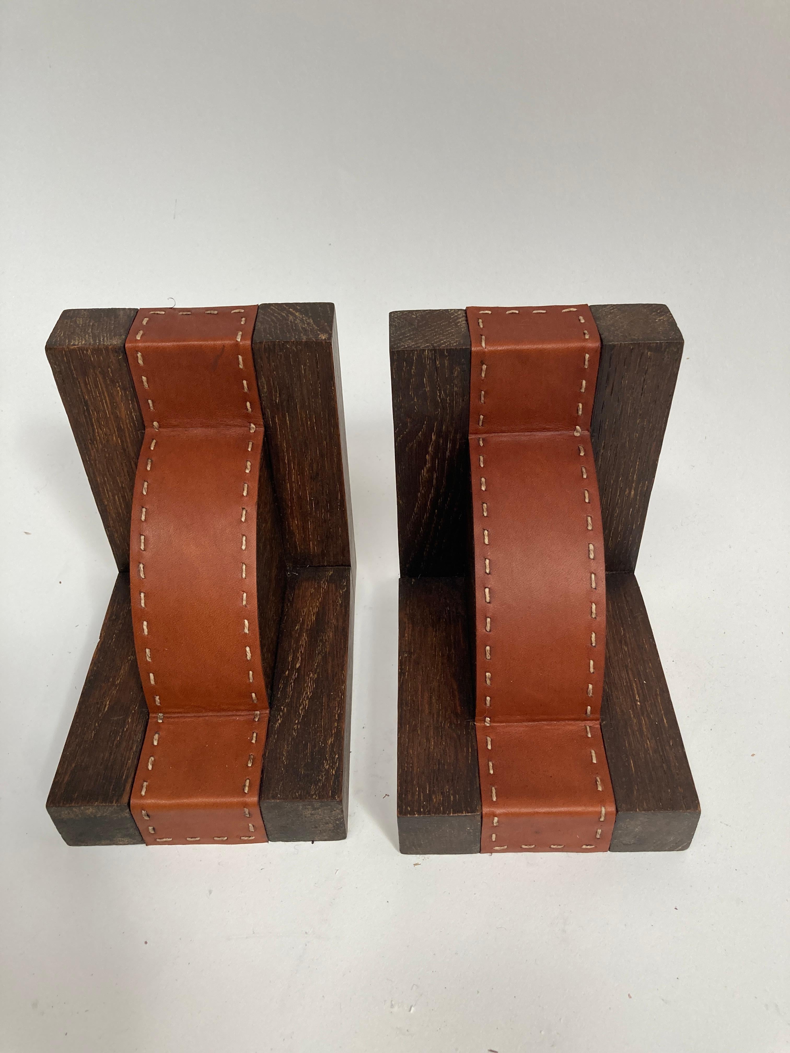Mid-20th Century 1950's Pair of stitched Leather book end by Jacques Adnet For Sale