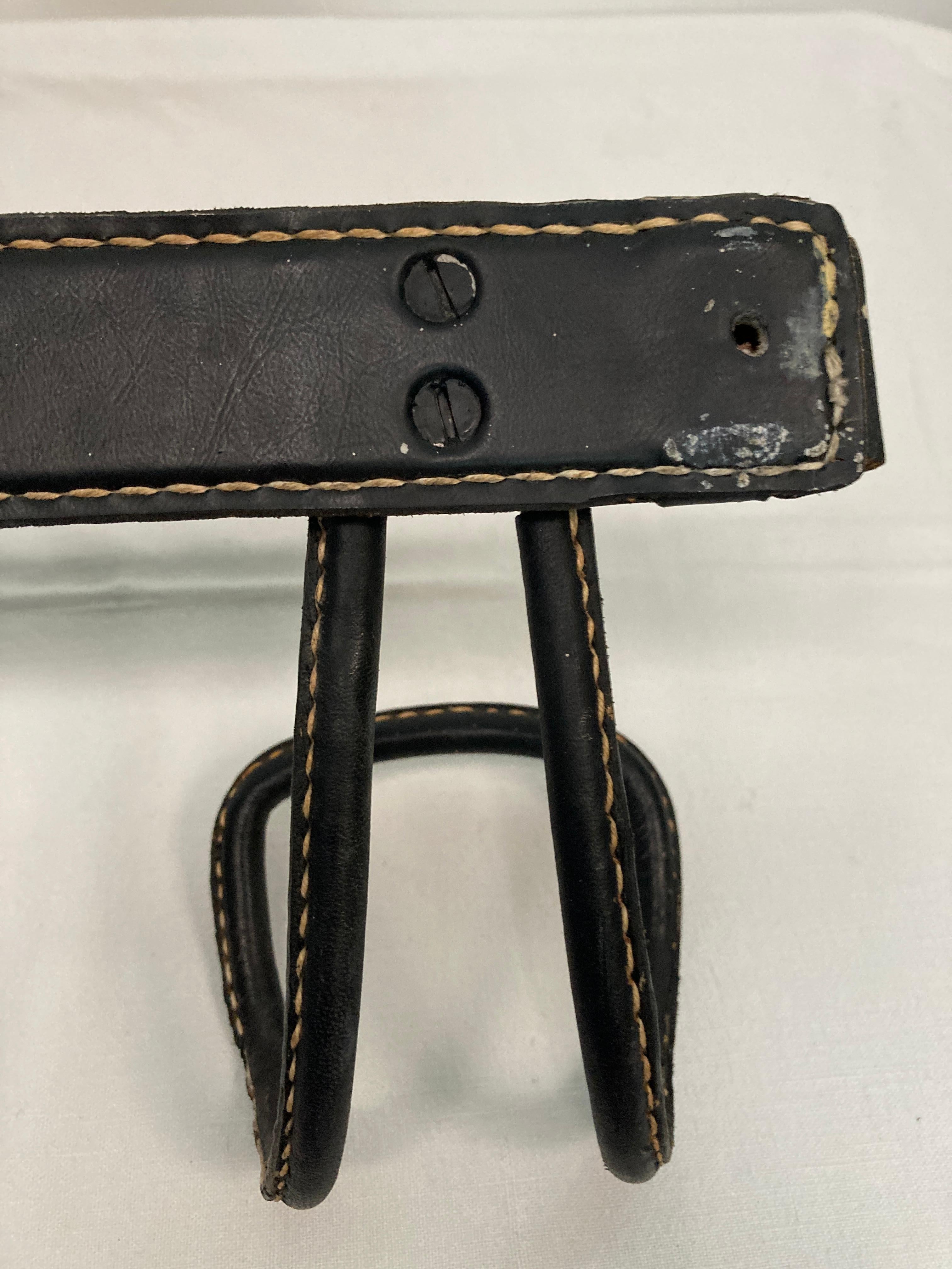 1950's Pair of Stitched leather coat rack by Jacques Adnet For Sale 2