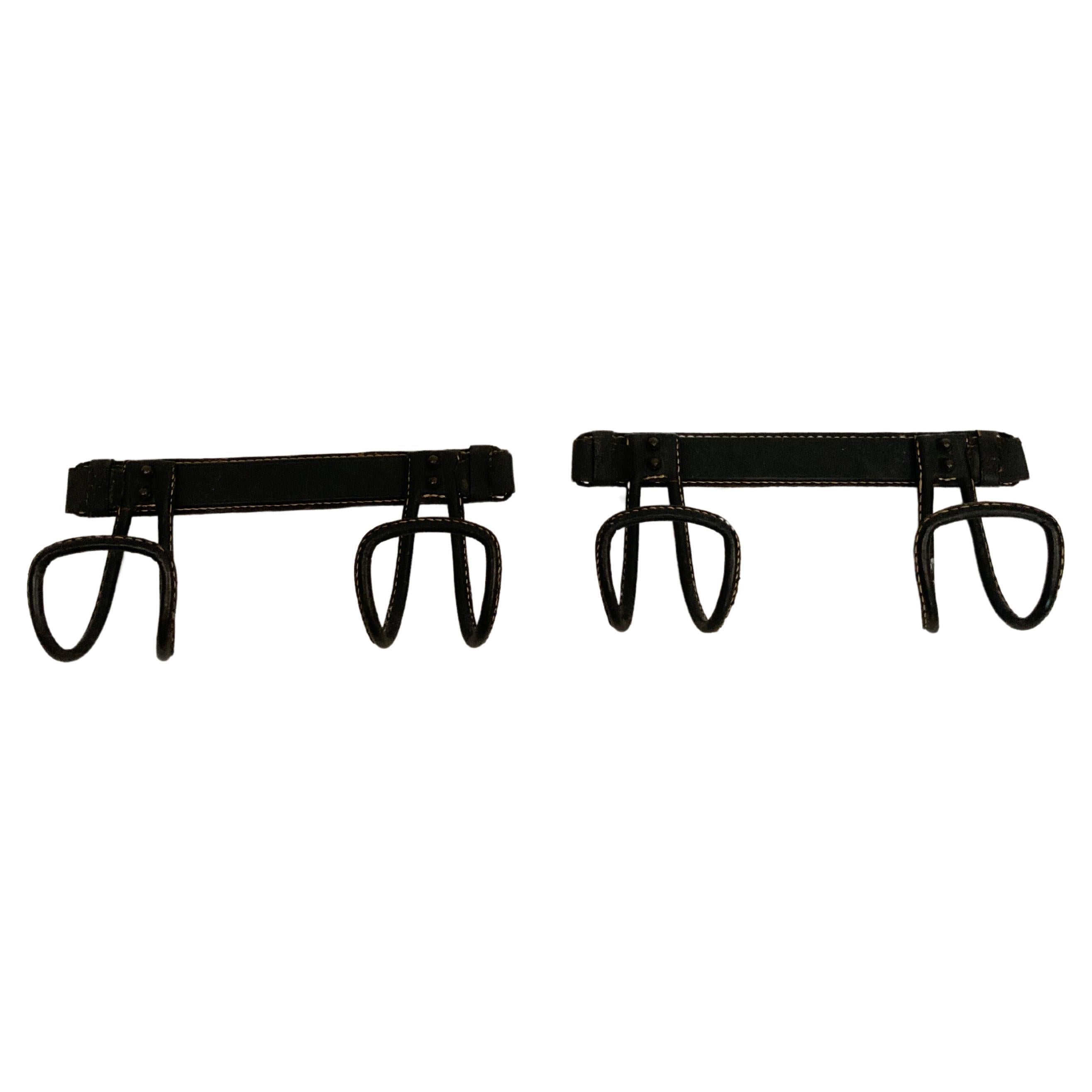 1950's Pair of Stitched leather coat rack by Jacques Adnet For Sale