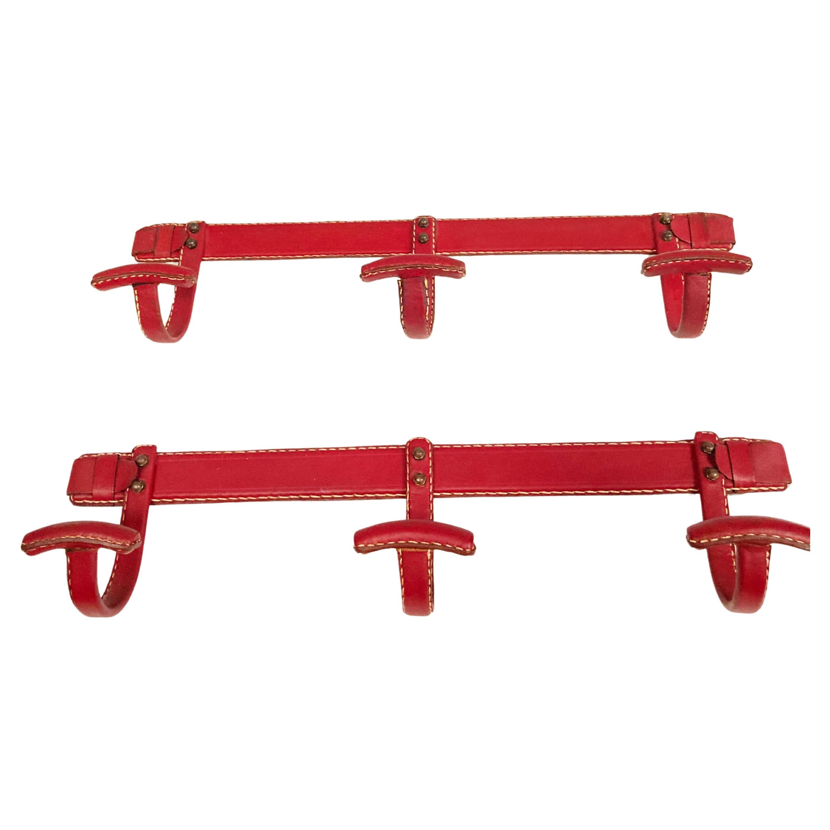 1950's pair of stitched leather coats rack by Jacques Adnet