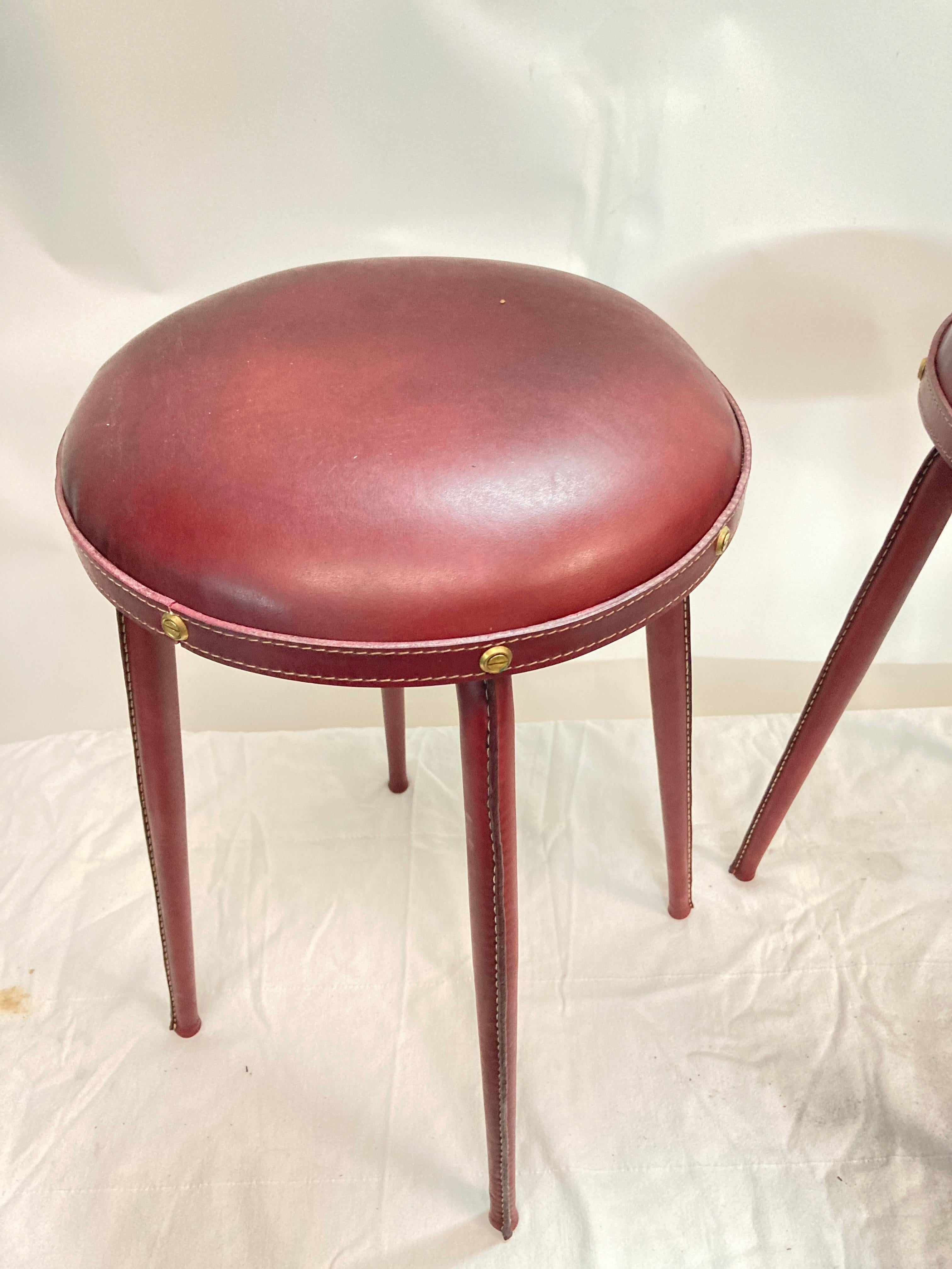 Nice pair of stitched leather  stools 
Burgundy
Jacques Adnet
France
1950's