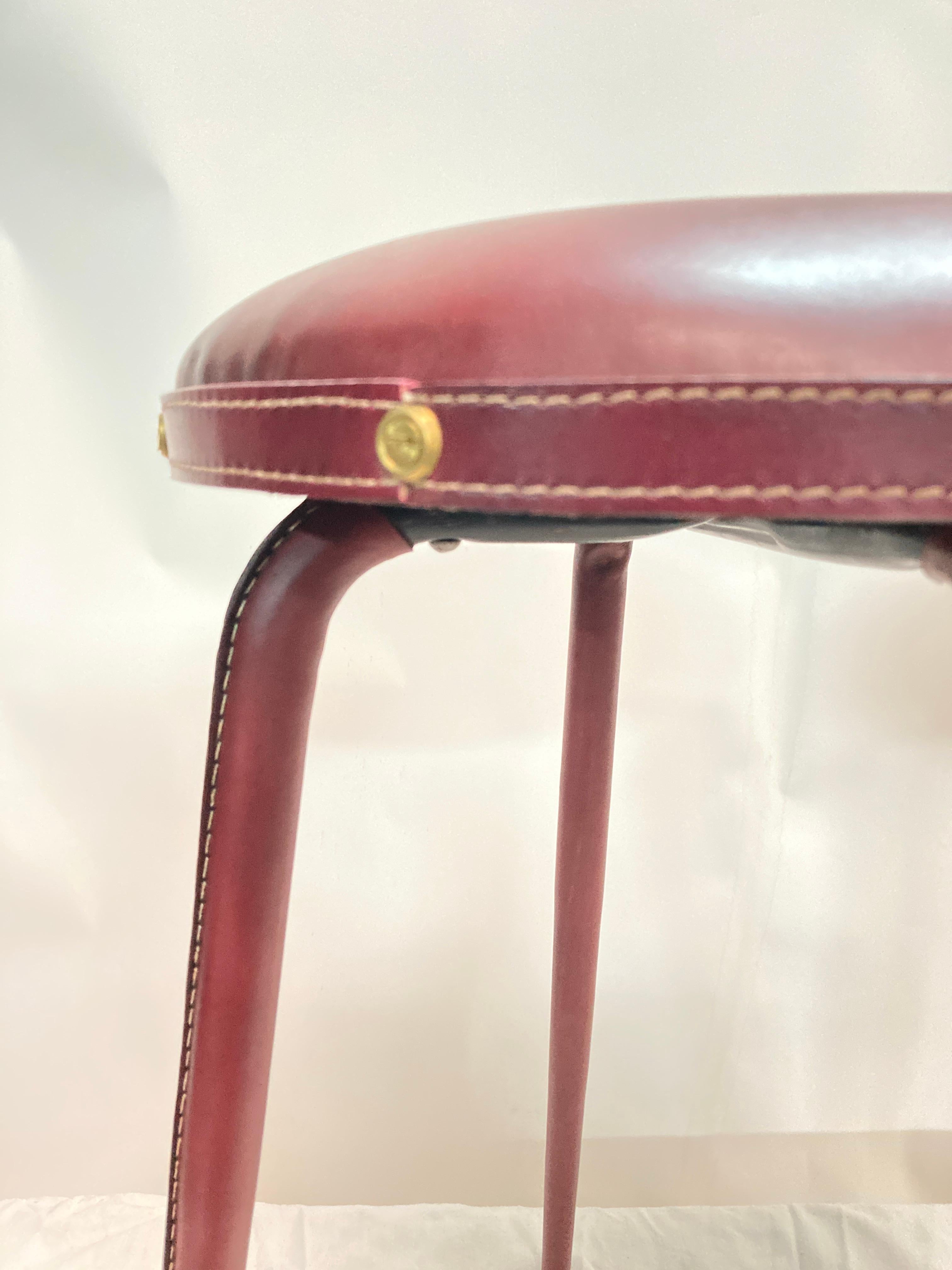 Mid-20th Century 1950's pair of stitched leather stools by Jacques Adnet For Sale