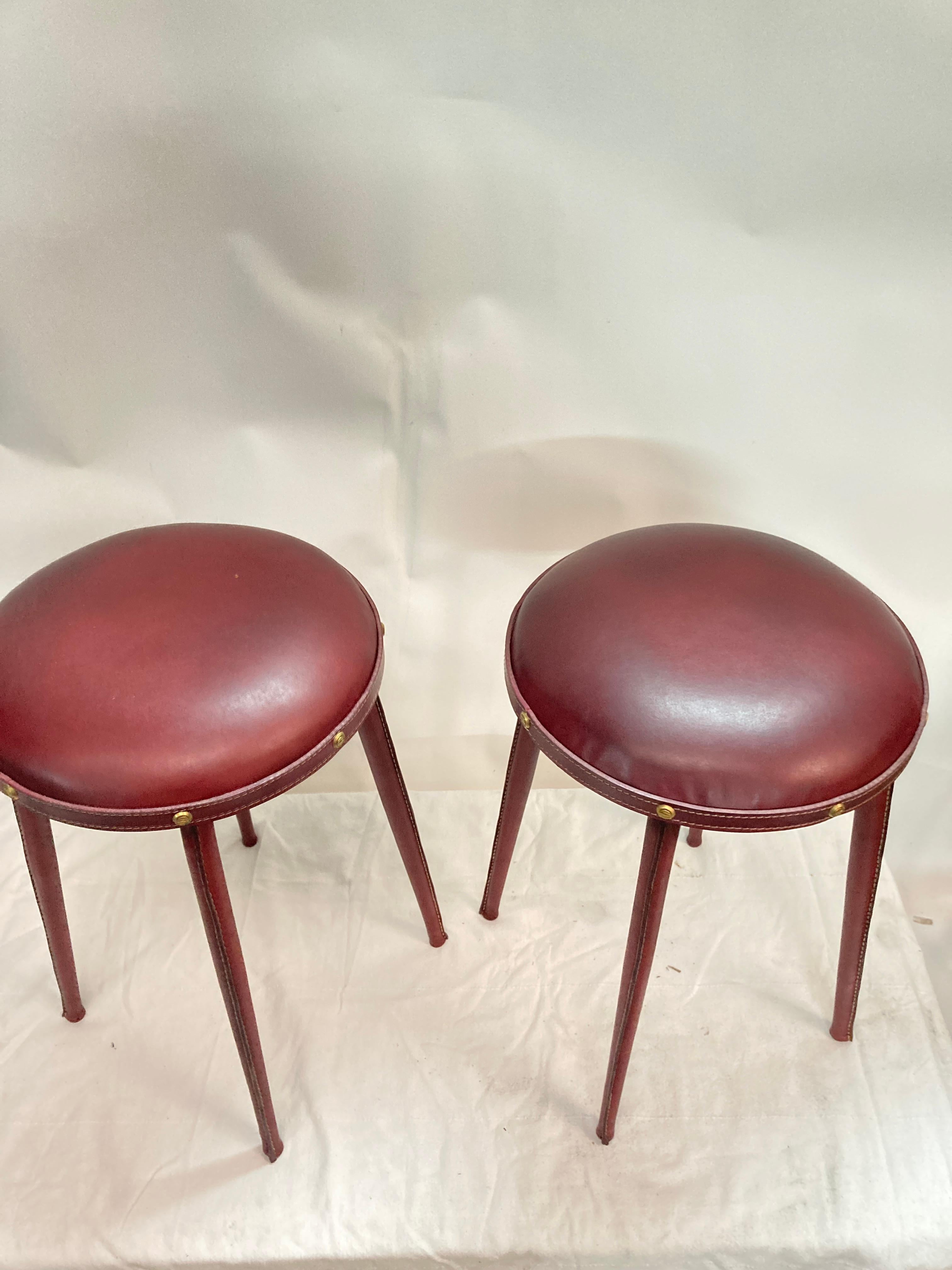 1950's pair of stitched leather stools by Jacques Adnet For Sale 1