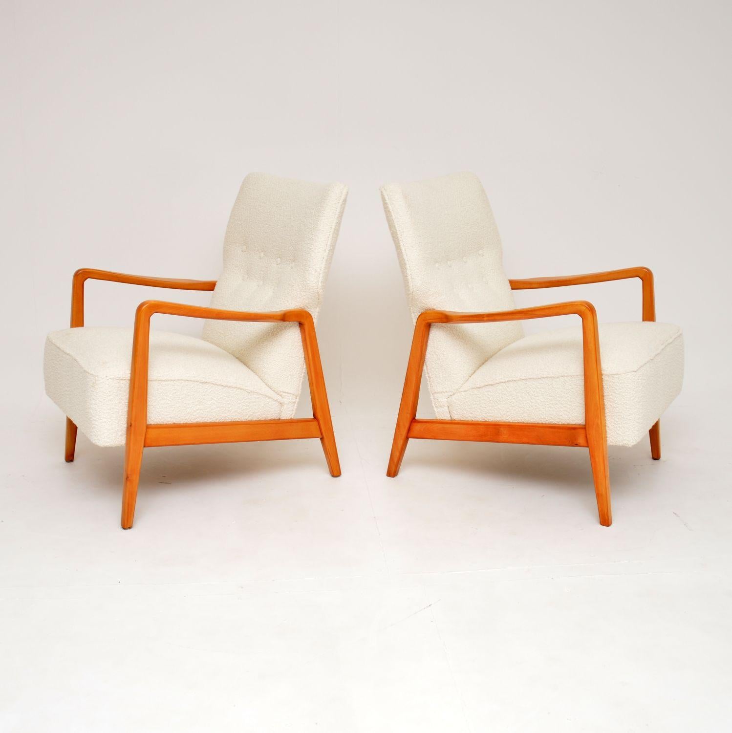 A superb pair of vintage Swedish armchairs. This model is called “Duxello’, they were designed by Folke Ohlsson and made by Dux in Sweden in the 1950-60’s.

The quality is outstanding, they are very well built and extremely comfortable, with well
