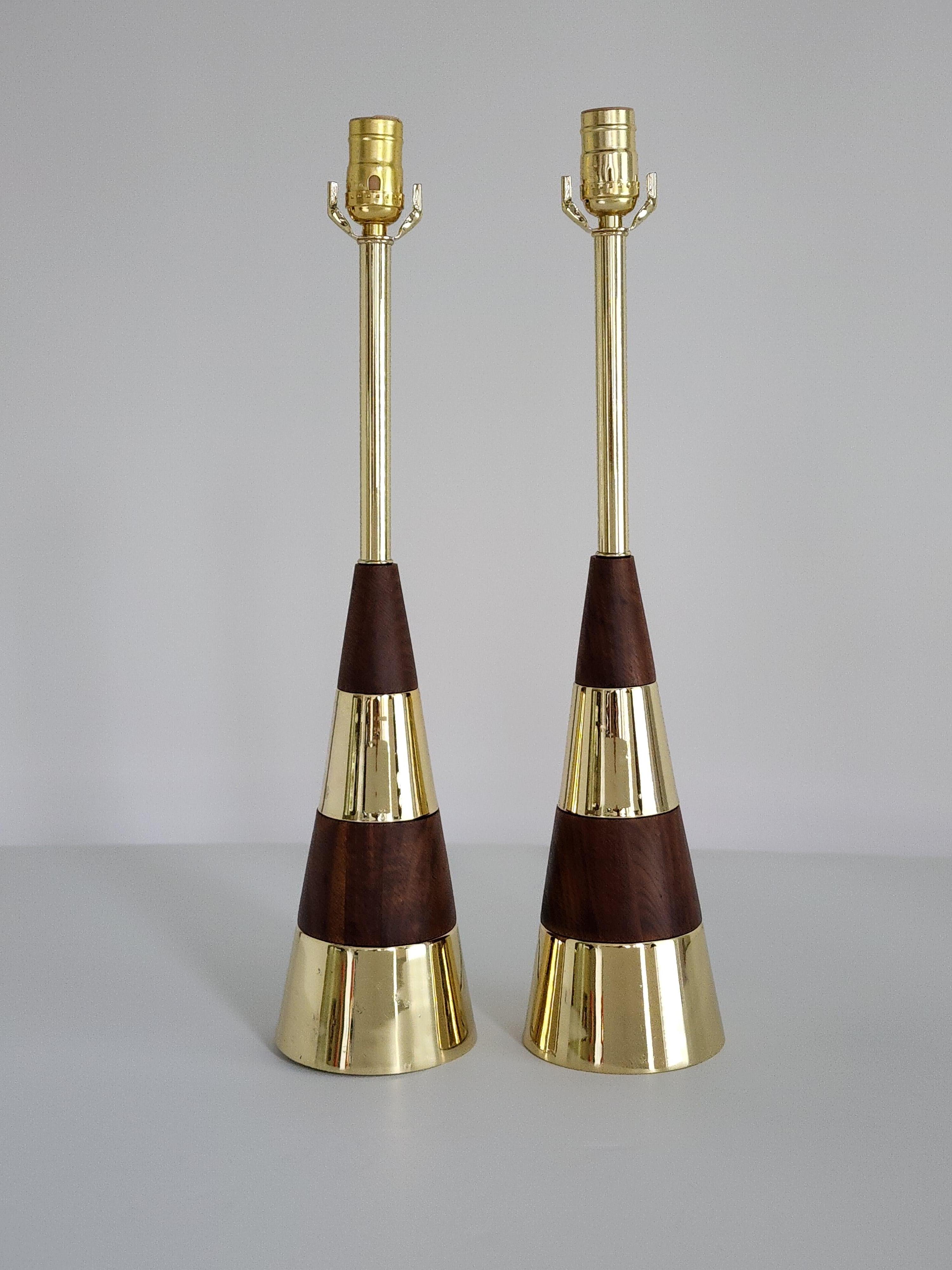 Pair of Tony Paul table lamp made of walnut and plated brass. 

In very good condition. 

Will be shipped with 8 inches harp. 

Overall height with harp 30 inches .

