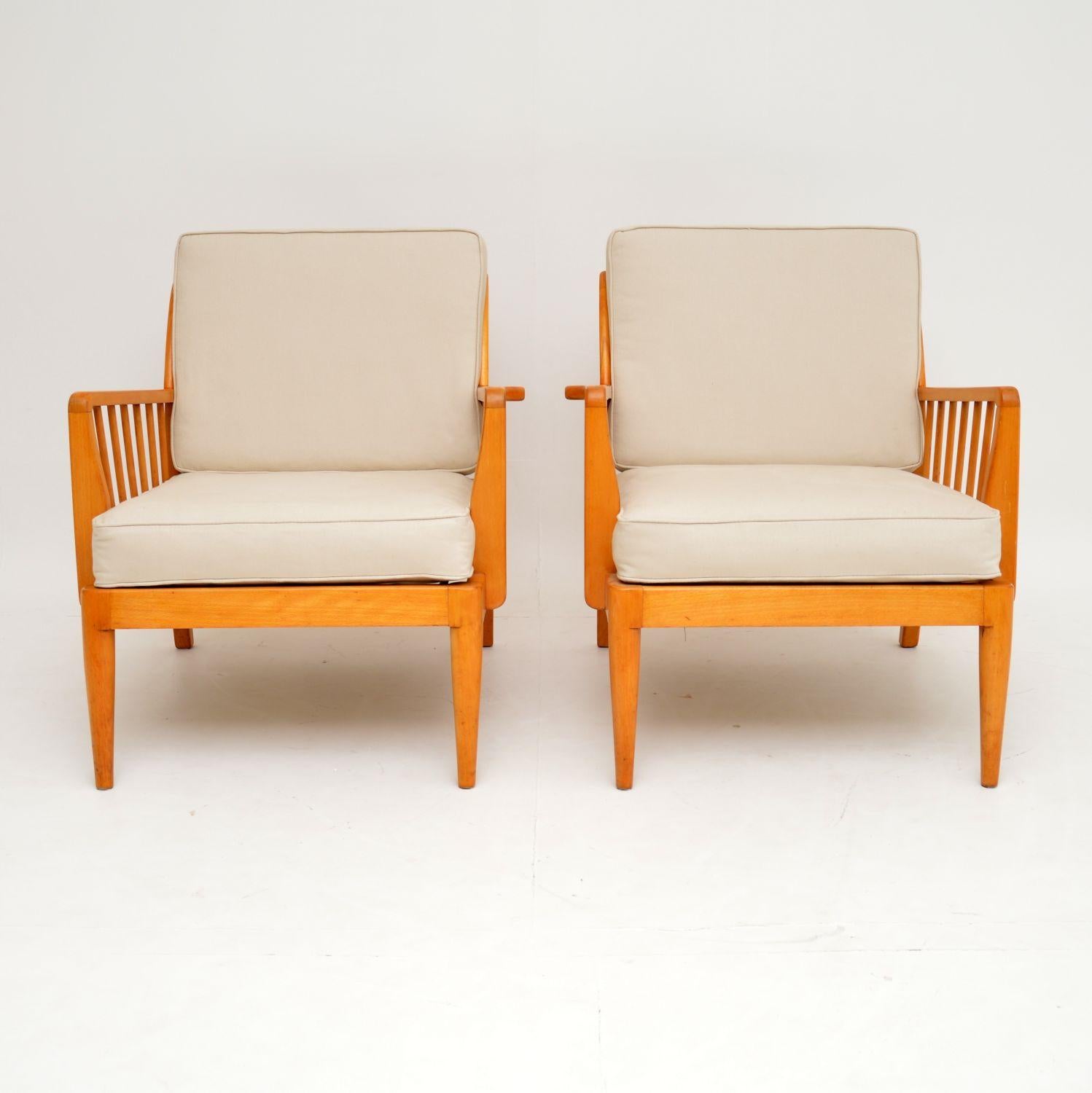 English 1950s Pair of Vintage Armchairs by George Stone