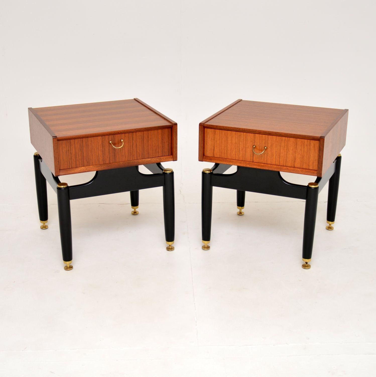 A fantastic pair of vintage side tables in tola wood, they were made by G Plan and date from the 1950-60’s.

They are a useful size, perfect for use as bedside tables or as lamp tables in a lounge setting. Each has a single drawer, and sits on