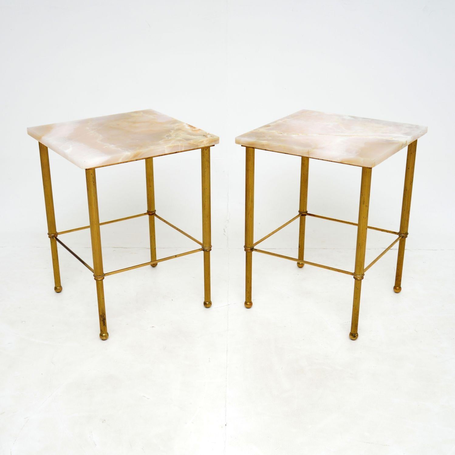 An excellent pair of vintage side tables in solid brass with fixed marble tops. These were likely made in France or Italy, they date from around the 1950-1960’s.

They are beautifully designed and are of superb quality. The brass frames have