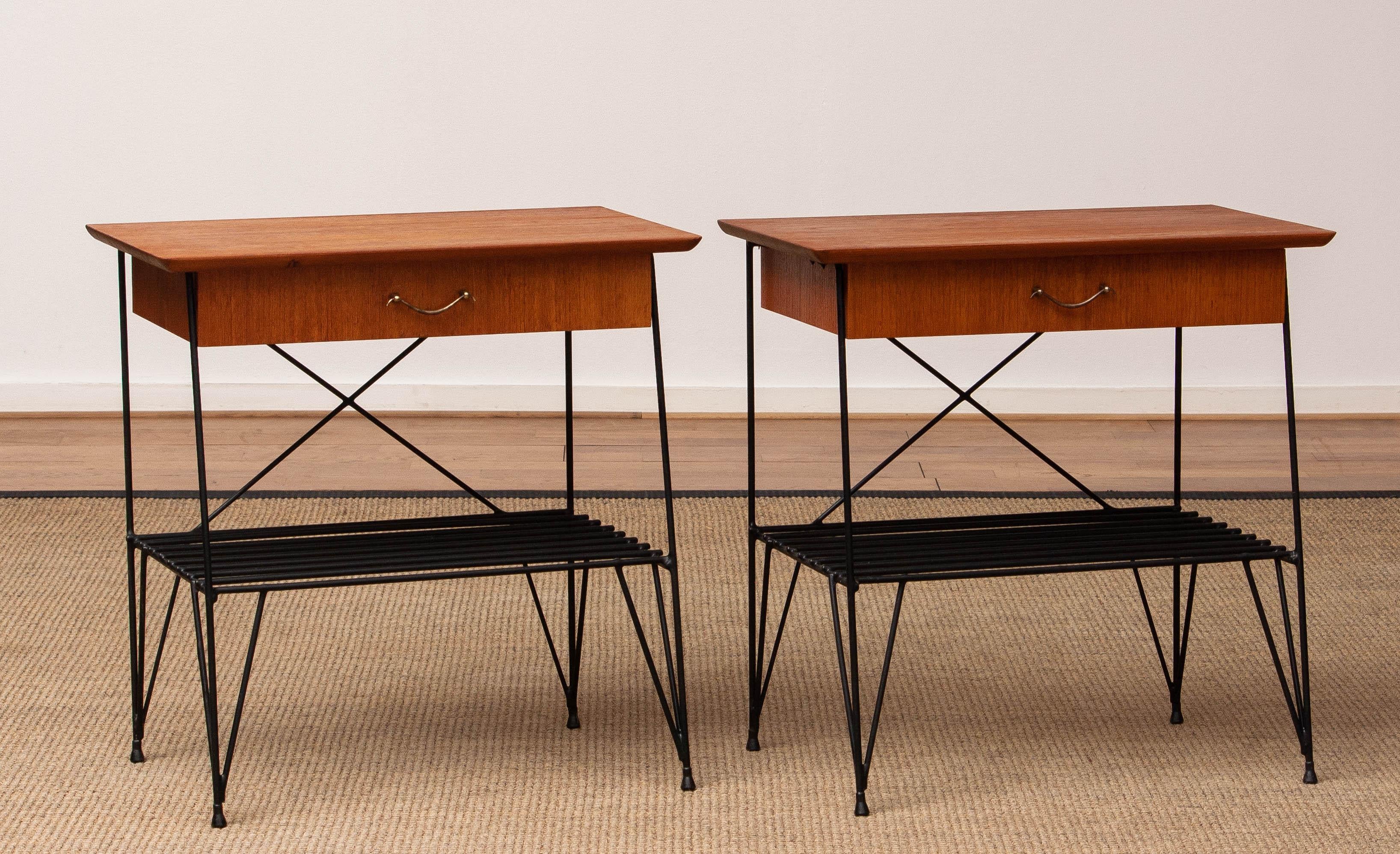 Beautiful and rare pair Swedish nightstands / side tables in the famous 'Johan Gullberg' style
made of metal wire in combination with a teak cabinet including one drawer each.
Period: 1950-1959, Sweden.
The dimensions are H 53 cm, W 52 cm, D 31