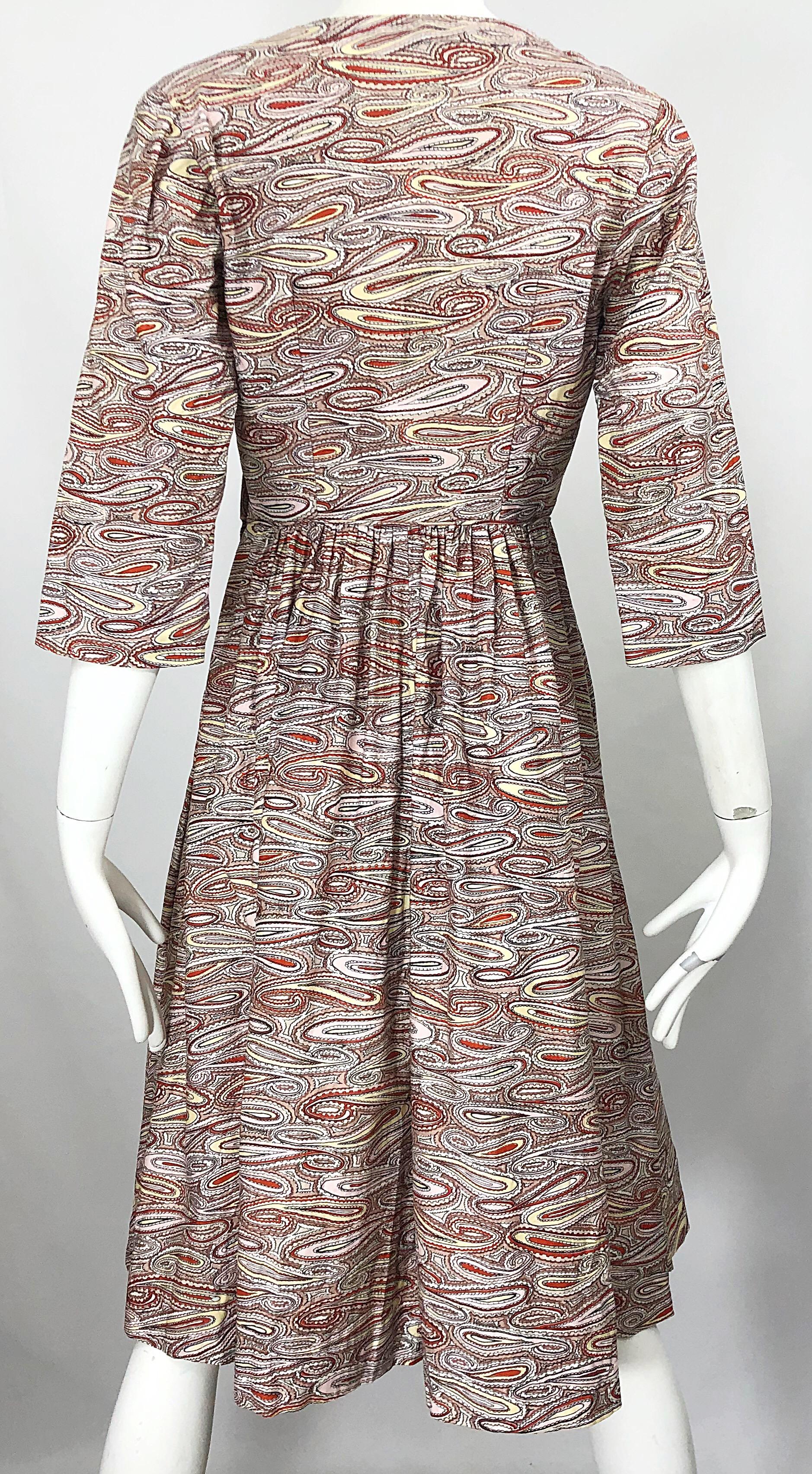 Women's 1950s Paisley Cotton 3/4 Sleeves Fit n' Flare Vintage 50s Bow Dress For Sale