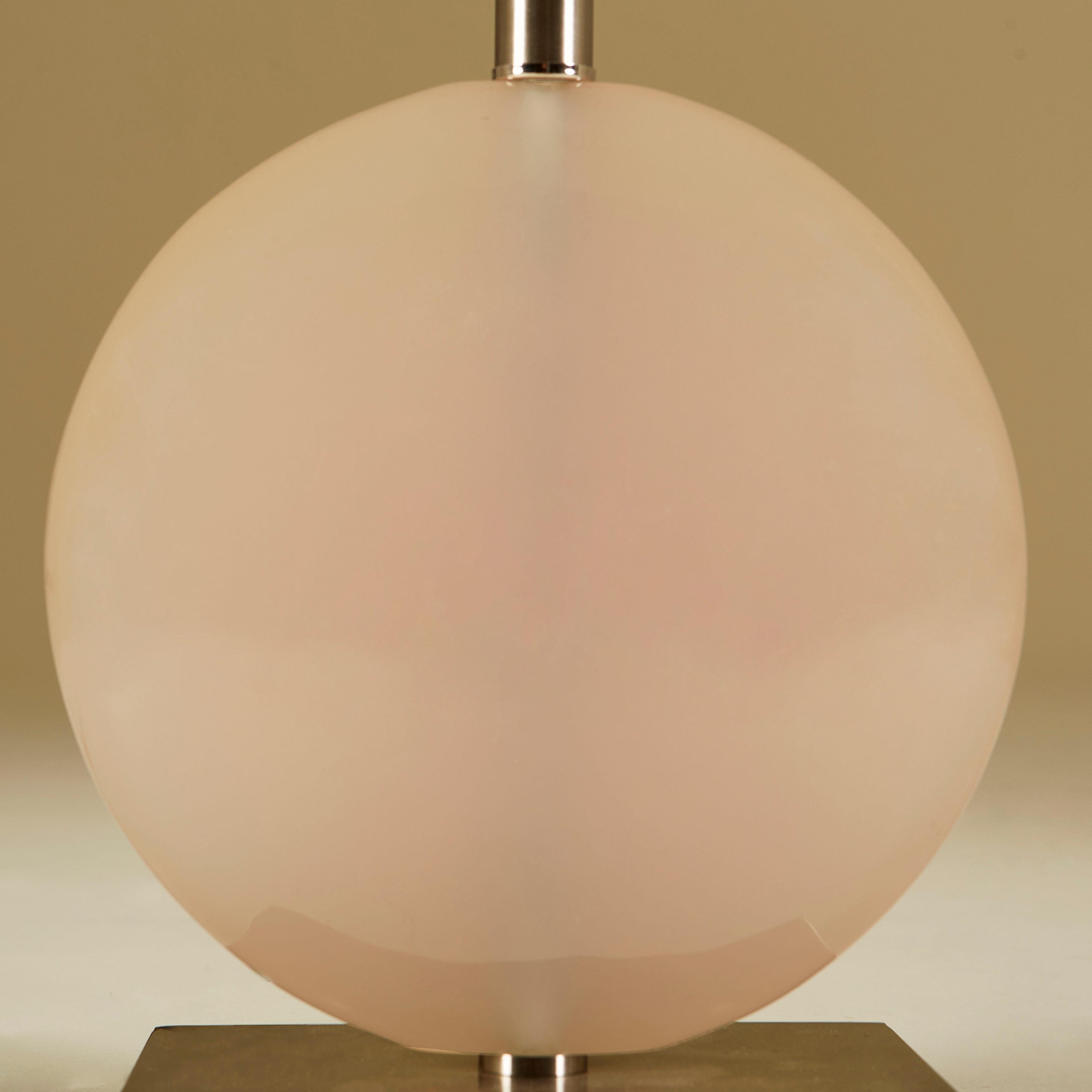 Gorgeous soft pale pink Lucite lamp. Sits on chrome rectangular base. Original shade available.