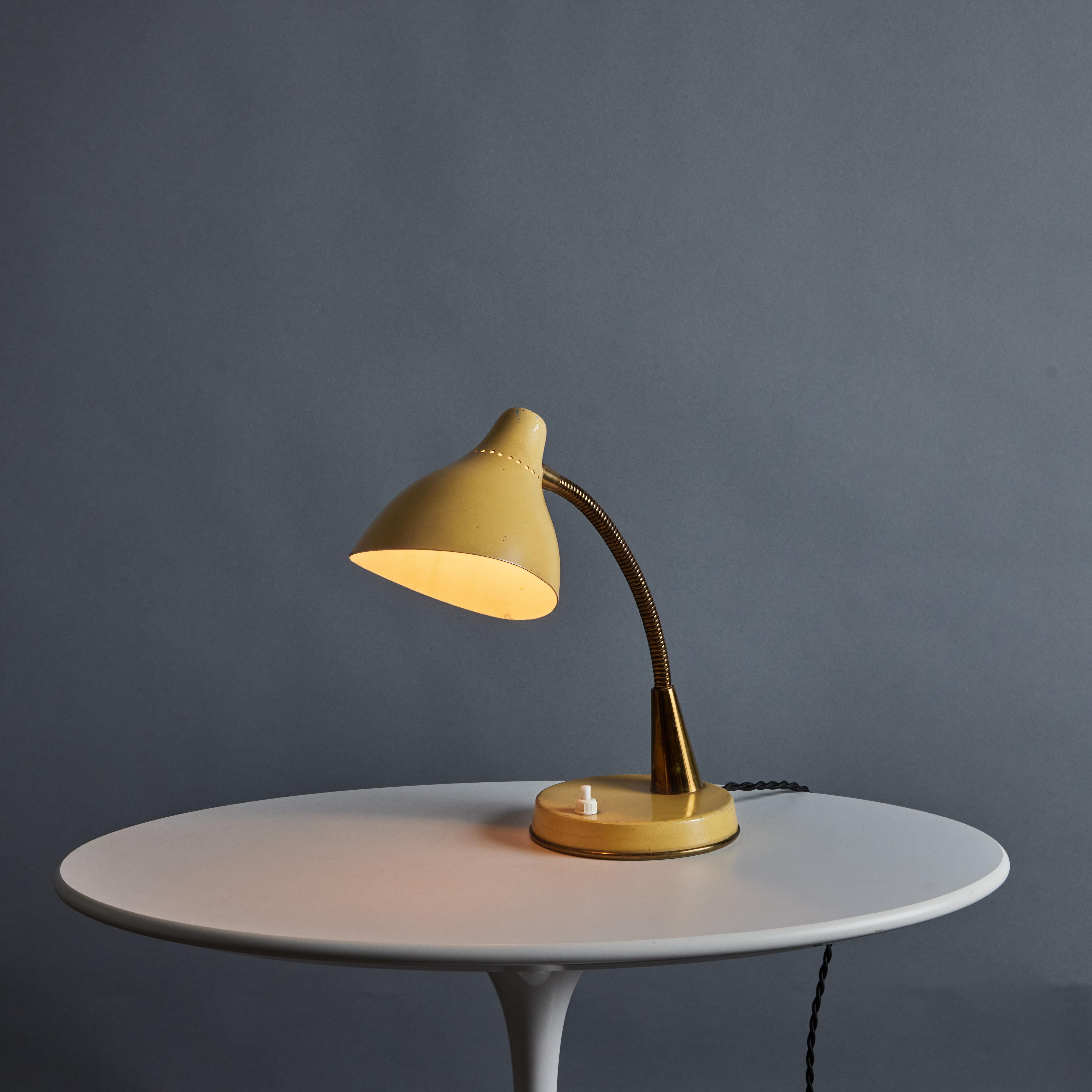 1950s Perforated Painted Metal & Brass Table Lamp Attributed to Stilnovo. Executed in painted perforated metal shade and base with patinated brass gooseneck arm. A sculptural and refined design characteristic of midcentury Italian design at its