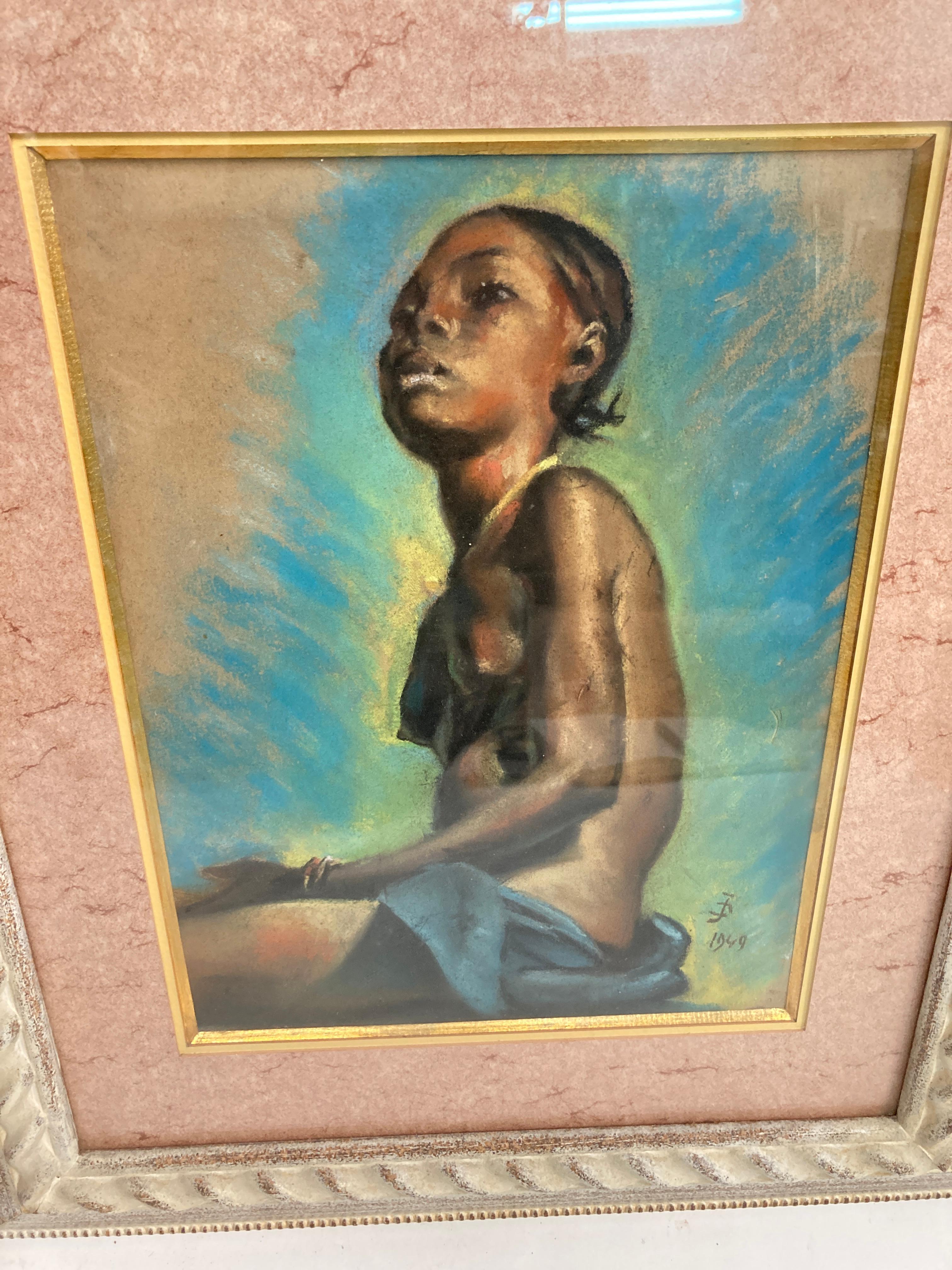 Pastel painting show a young African woman 
Dated 1949
Monogrammed J E