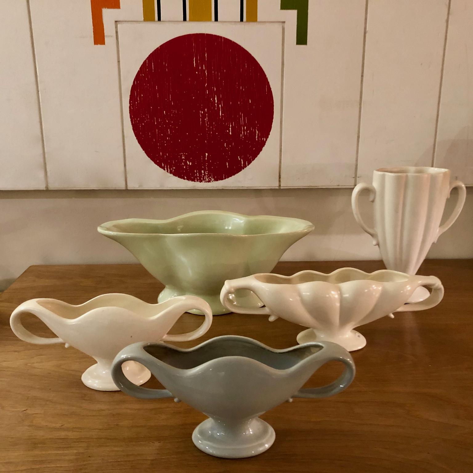 An unusual pastel green glazed flower arranging vase as designed in the 1930s by Constance Spry, and made by the Fulham Pottery Company, circa 1940's 1950s.
 