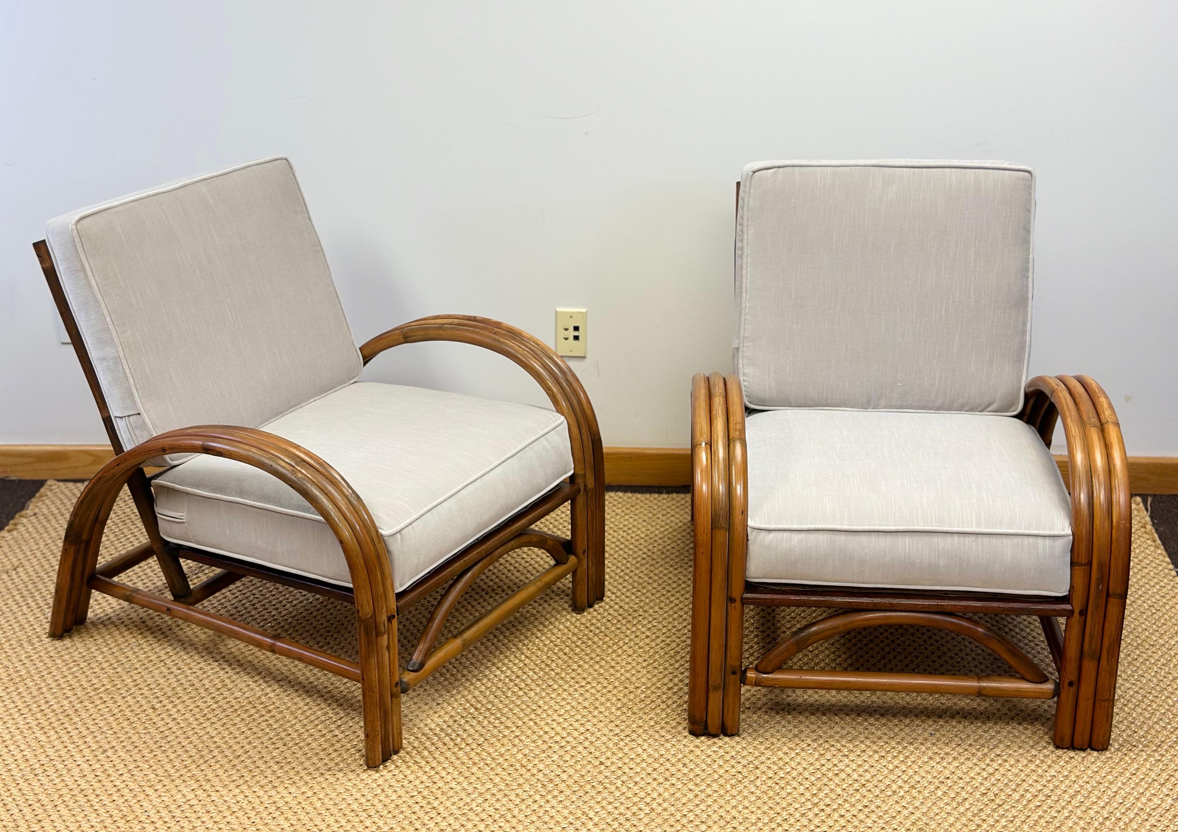 We are very pleased to offer a pair of chairs in the style of Paul Frankl made of rattan circa the 1950s.  These chairs represent Frankl's distinct approach to design, combining Art Deco influences and a modernist, California-inspired aesthetic. 