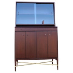 1950’s Paul McCobb China Cabinet With Disappearing Bifold Doors.