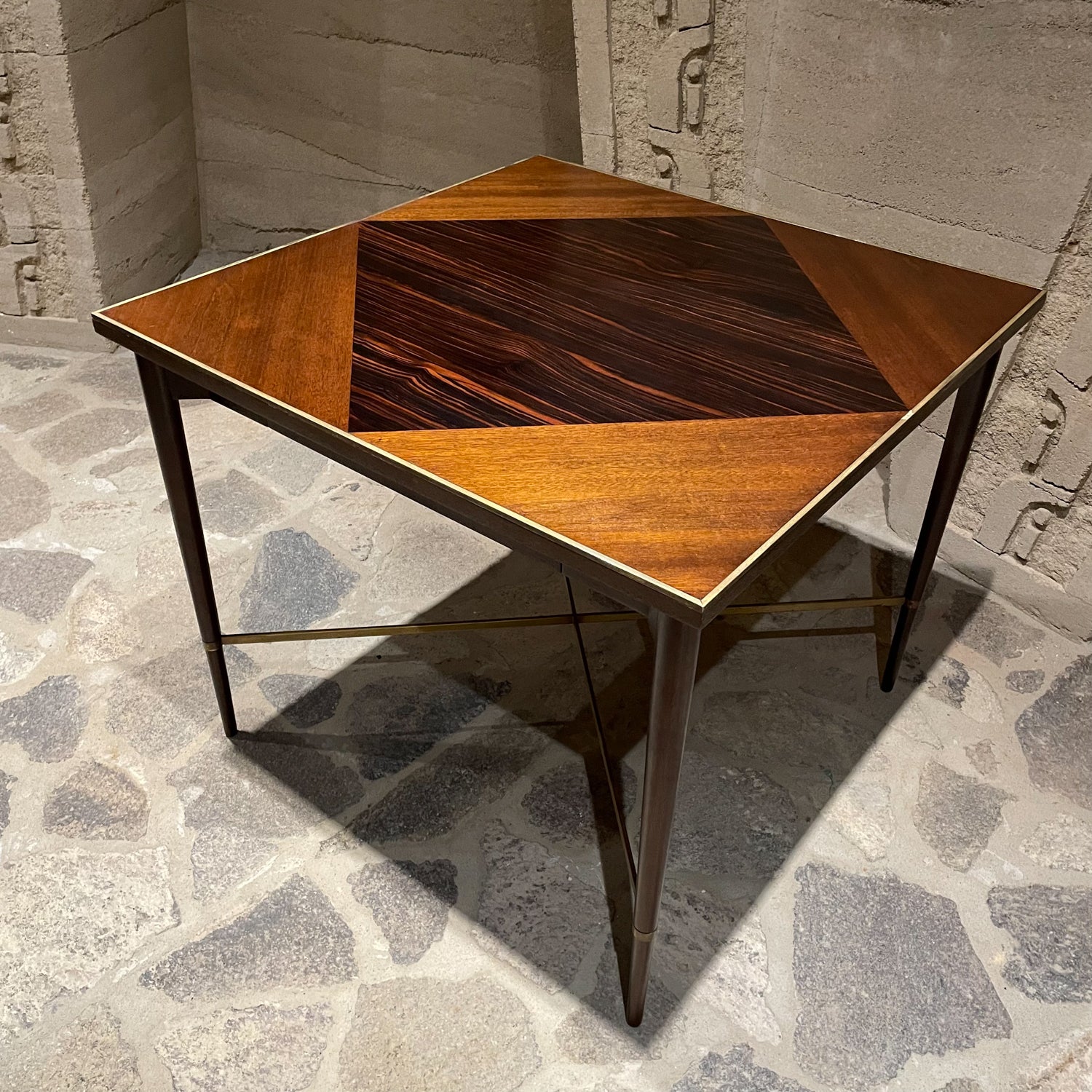 Paul Mccobb side table
1950s Paul McCobb diamond side table Connoisseur Collection for H Sacks & Sons of Brookline, MA.
Mahogany Rosewood & Brass Side table with a drawer.
This exquisite table designed by Paul McCobb; mahogany wood with rosewood