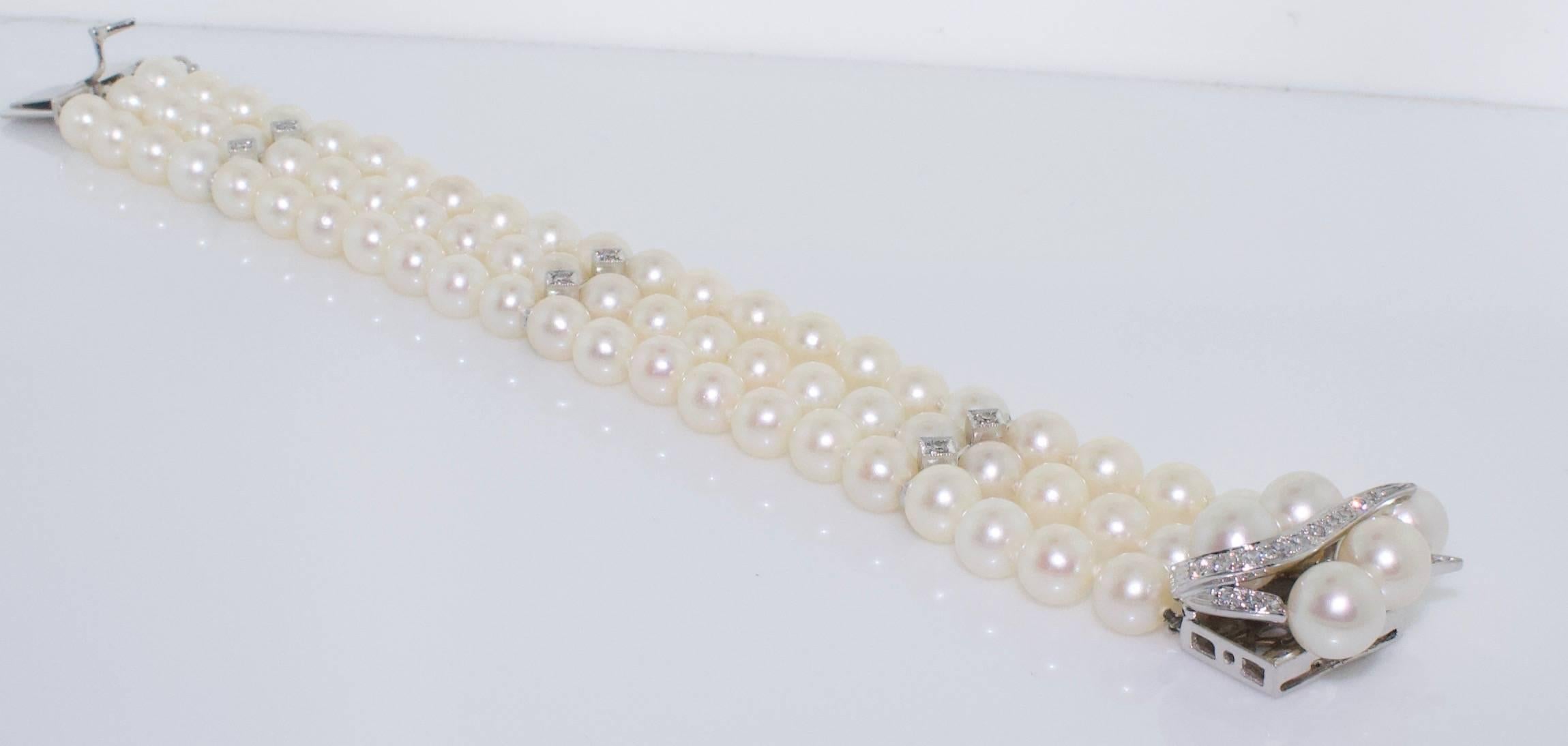 1950's Pearl and Diamond Bracelet 
Twenty One Round Diamonds weighing .50 carats approximately  GH VVS-SI1
Seventy One 6.5 mm Round Pearls
Entirely  Flexible.  I wish I could say the same thing about me!
 