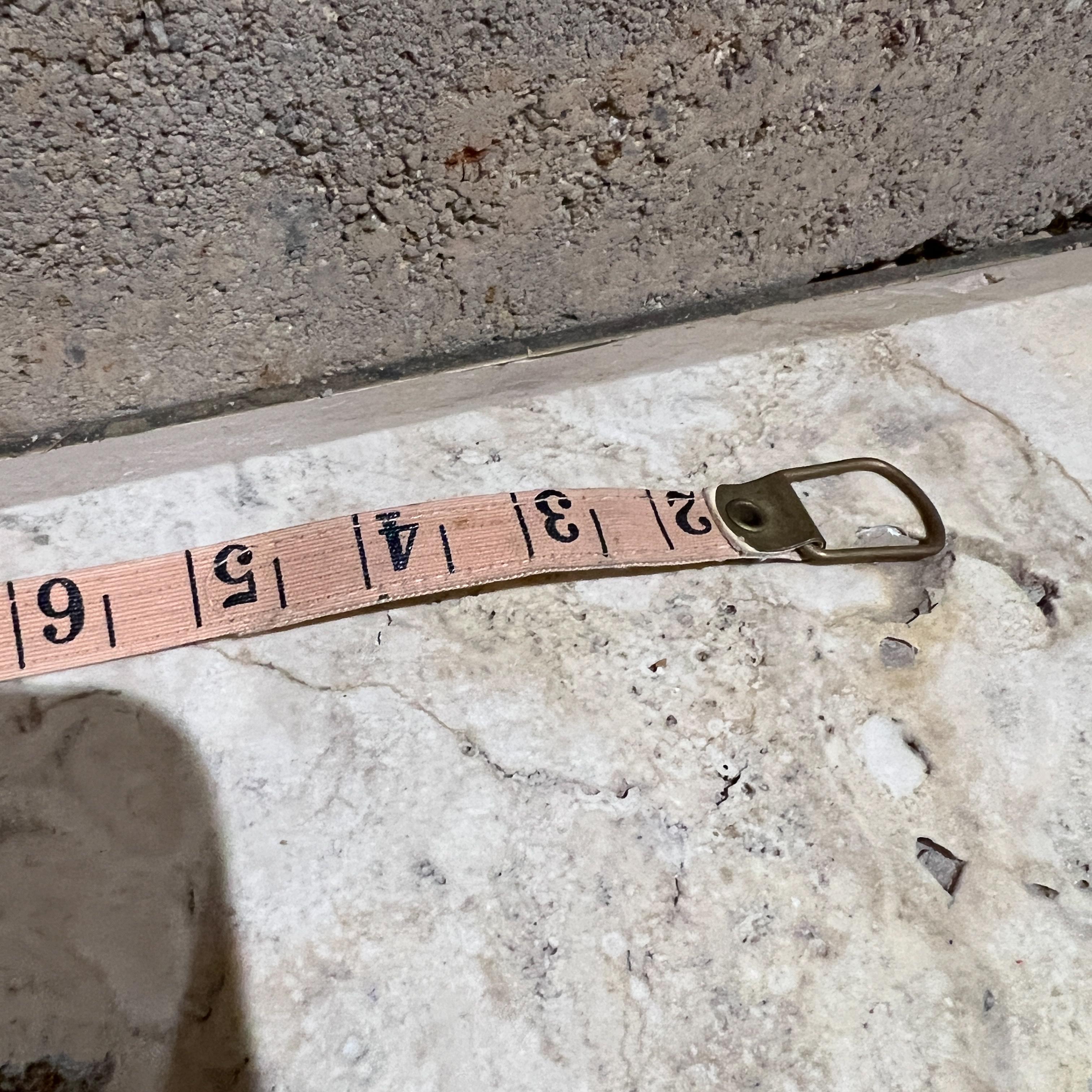 Brass 1950s Olympic Tape Measure Peoples Republic of China For Sale