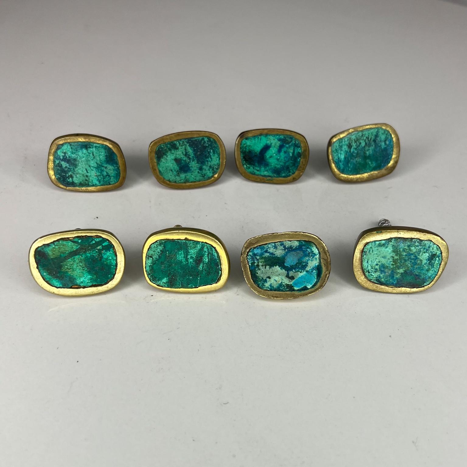 1950s Exquisite set of 8 pull knobs by famed artist designer Pepe Mendoza Mexico. 
Bronze Brass Inlay Malachite Stone
Preowned Original vintage condition. Two retain the original label. 
Different patinas Different screws on back.
Measures: 1.38