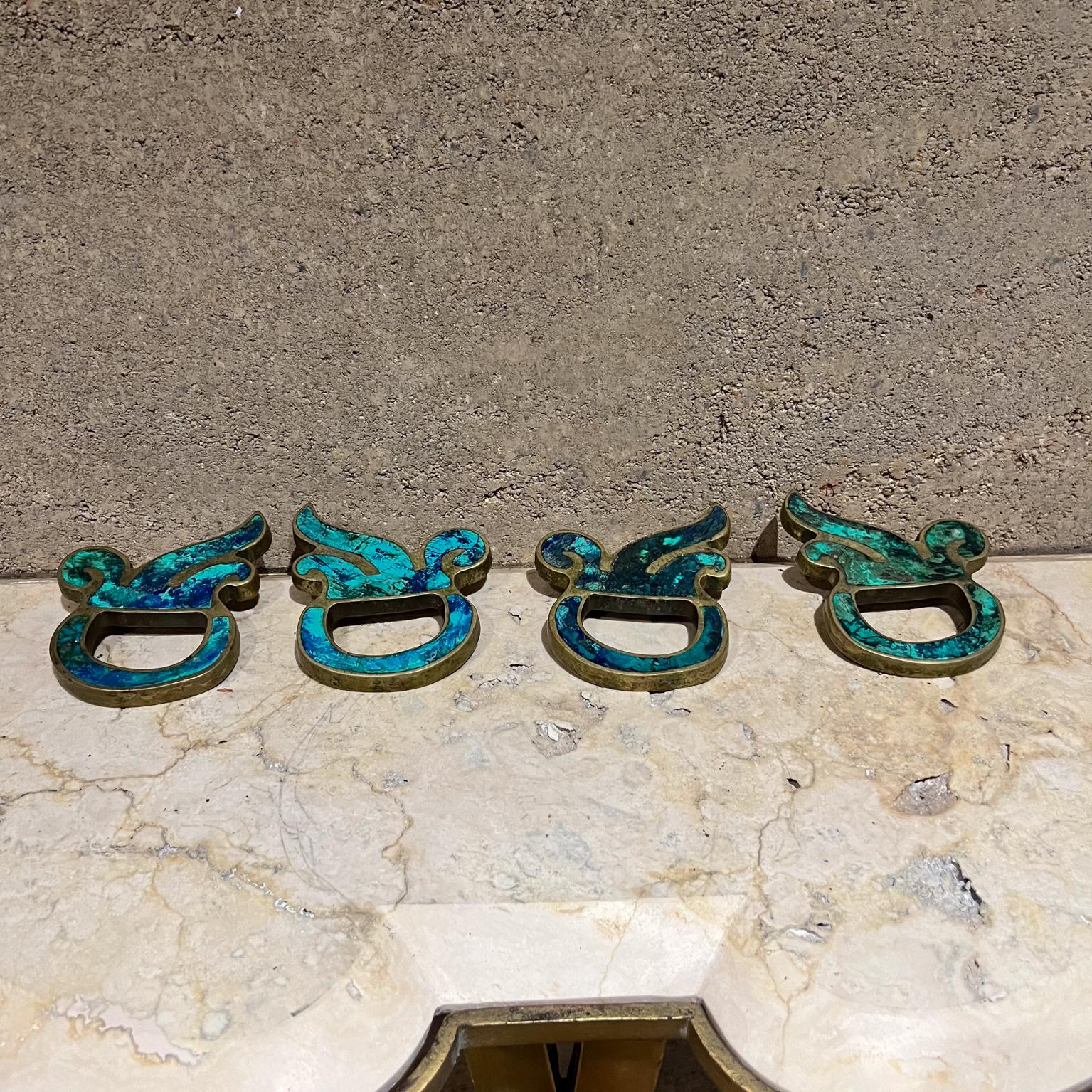 1950s Pepe Mendoza Sculptural Set 4 Pull Handles
Mayan Revival Malachite Brass
3.75 h x 4.25 w x 1 d
Maker stamped
Preowned vintage condition
See all images for details