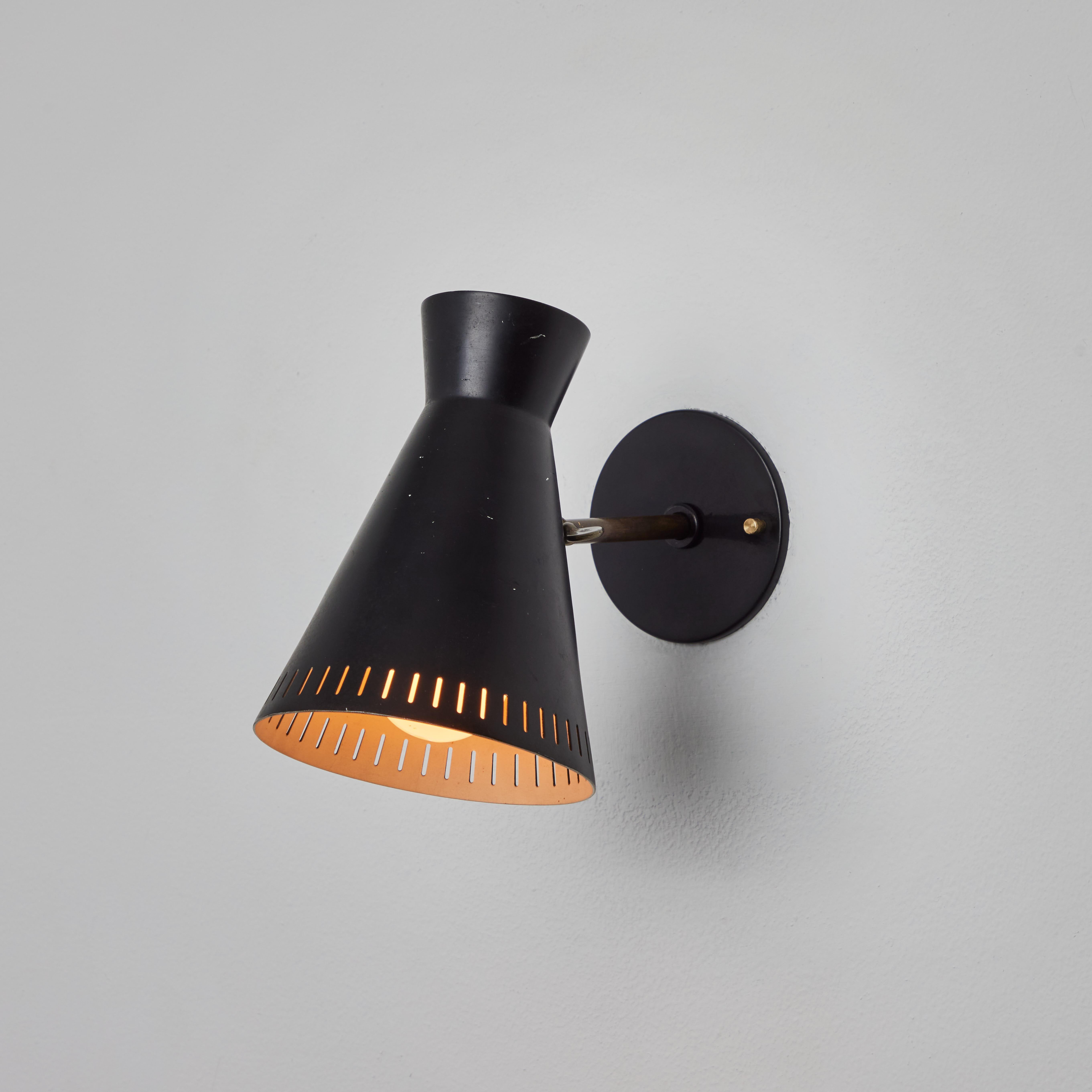 Painted 1950s Perforated Black Metal Diabolo Wall Lamp Attributed to Mauri Almari For Sale
