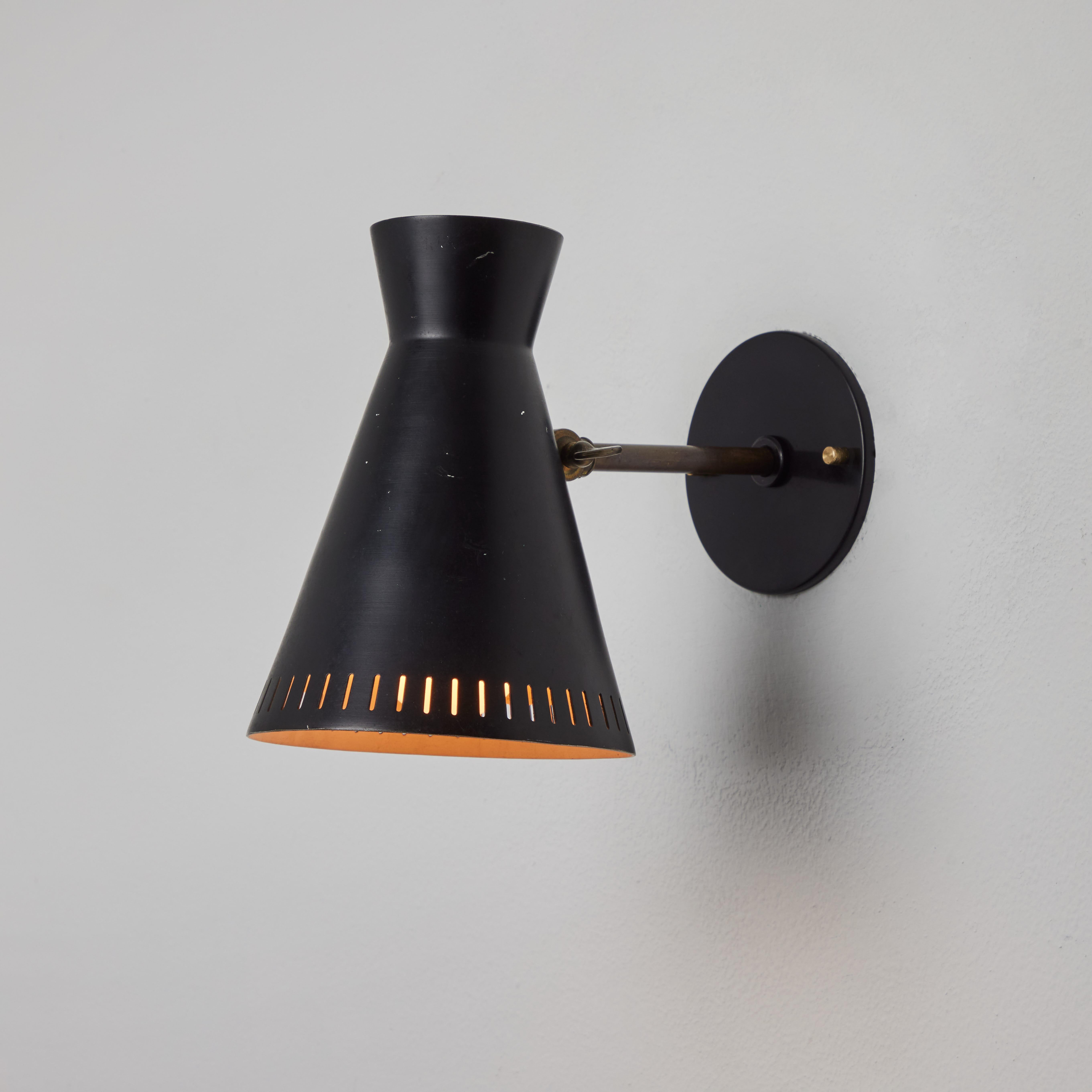 1950s Perforated Black Metal Diabolo Wall Lamp Attributed to Mauri Almari In Good Condition For Sale In Glendale, CA