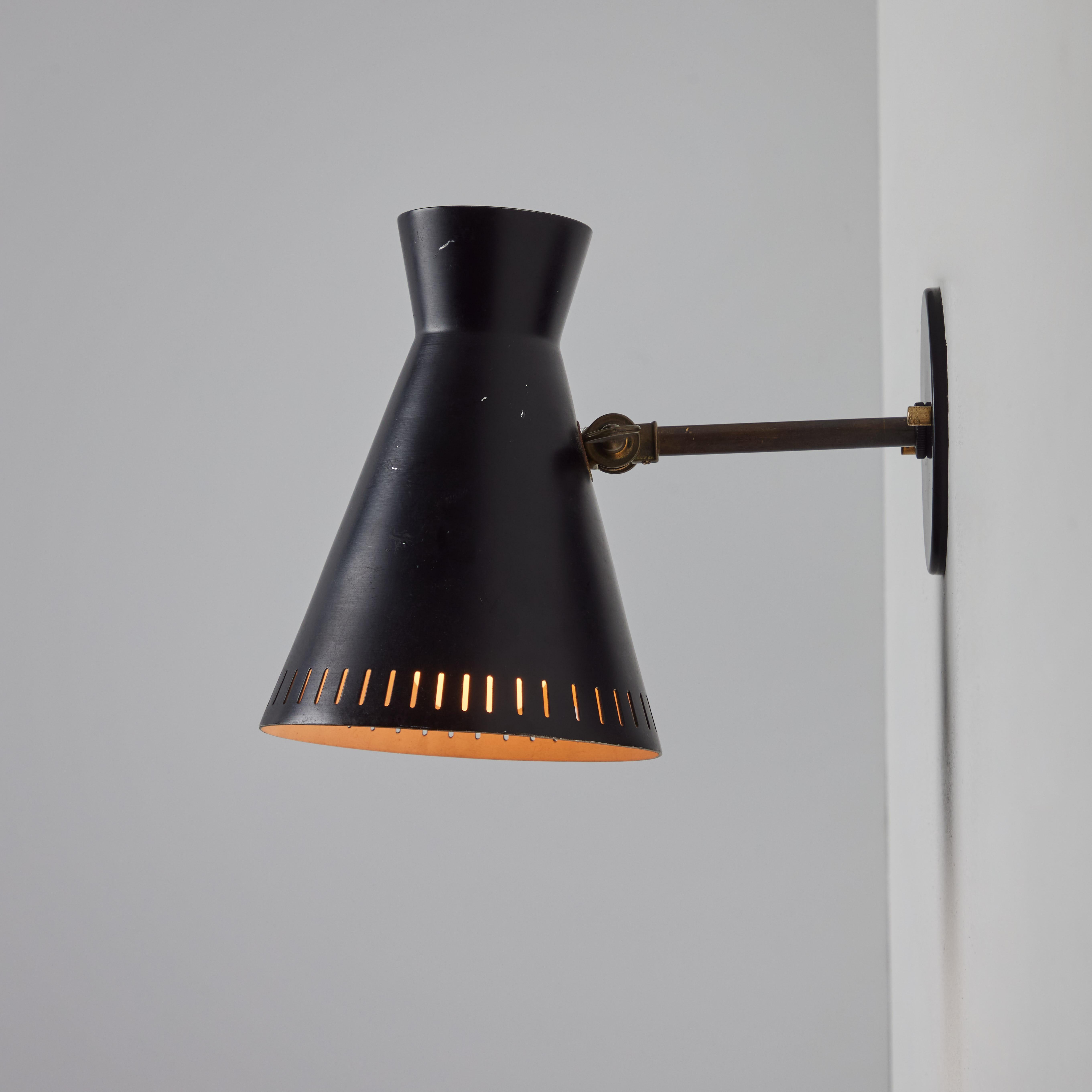 1950s Perforated Black Metal Diabolo Wall Lamp Attributed to Mauri Almari For Sale 1