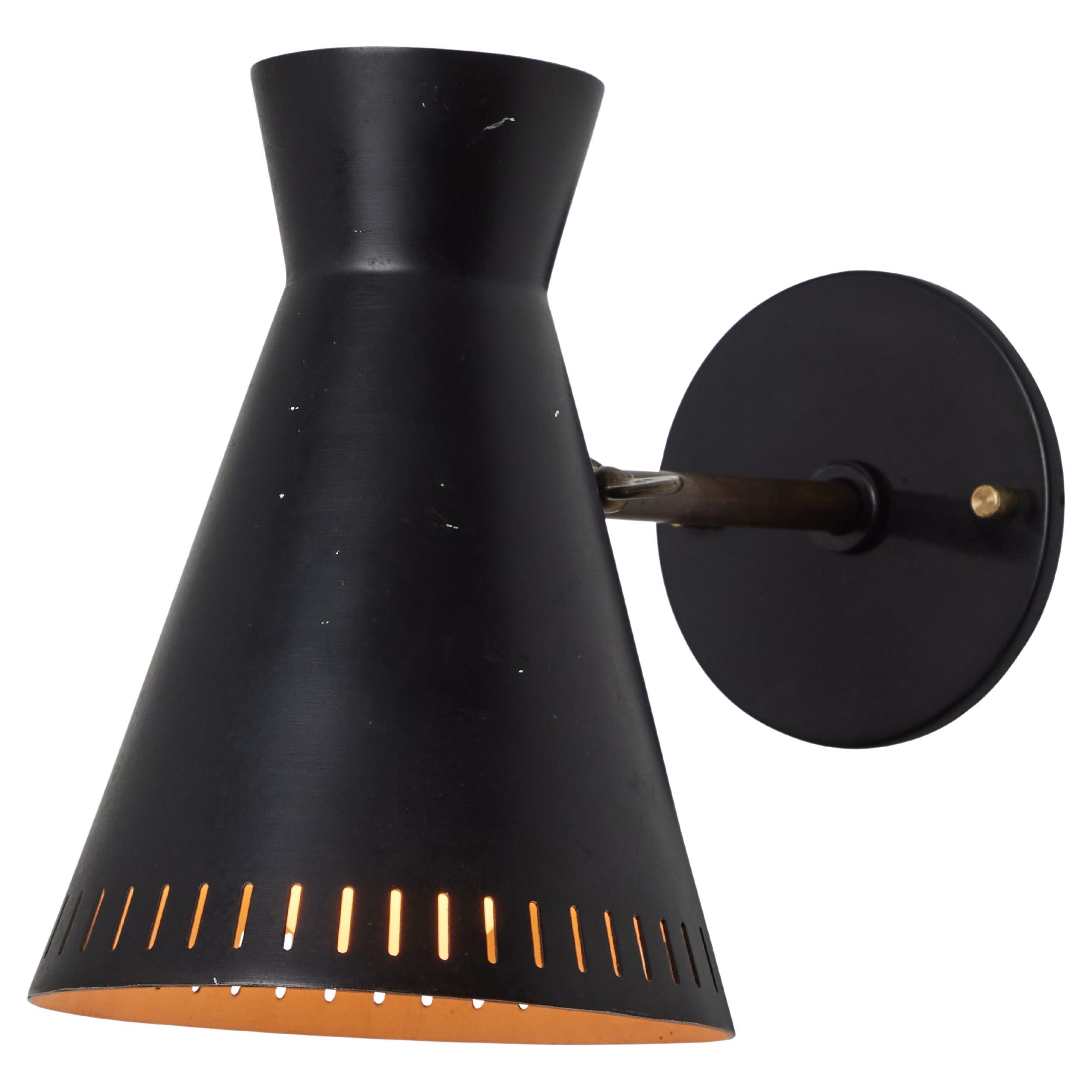 1950s Perforated Black Metal Diabolo Wall Lamp Attributed to Mauri Almari For Sale