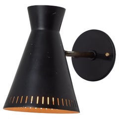 1950s Perforated Black Metal Diabolo Wall Lamp Attributed to Mauri Almari