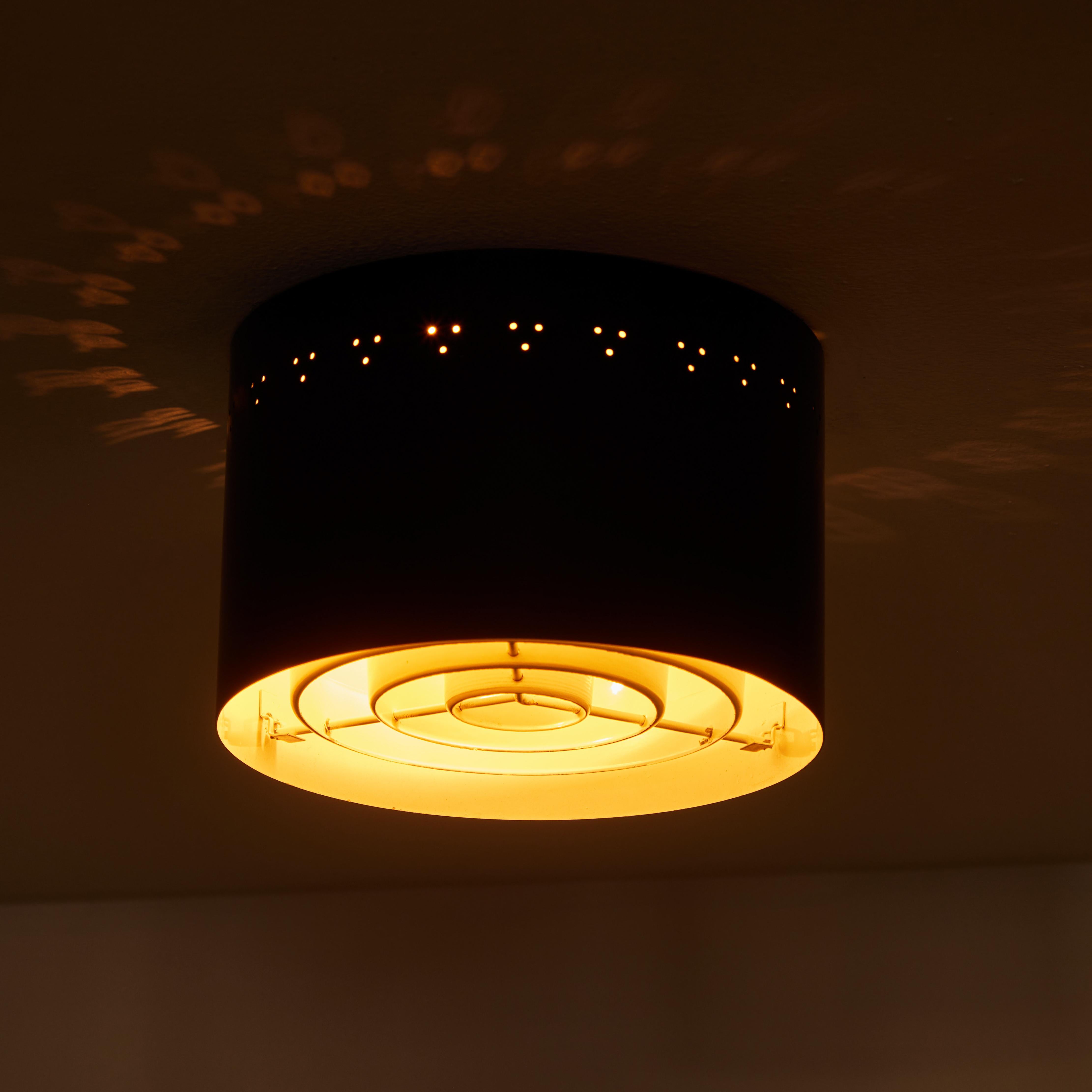 Mid-Century Modern 1950s Perforated Black Metal Flush Mount Attributed to Jacques Biny