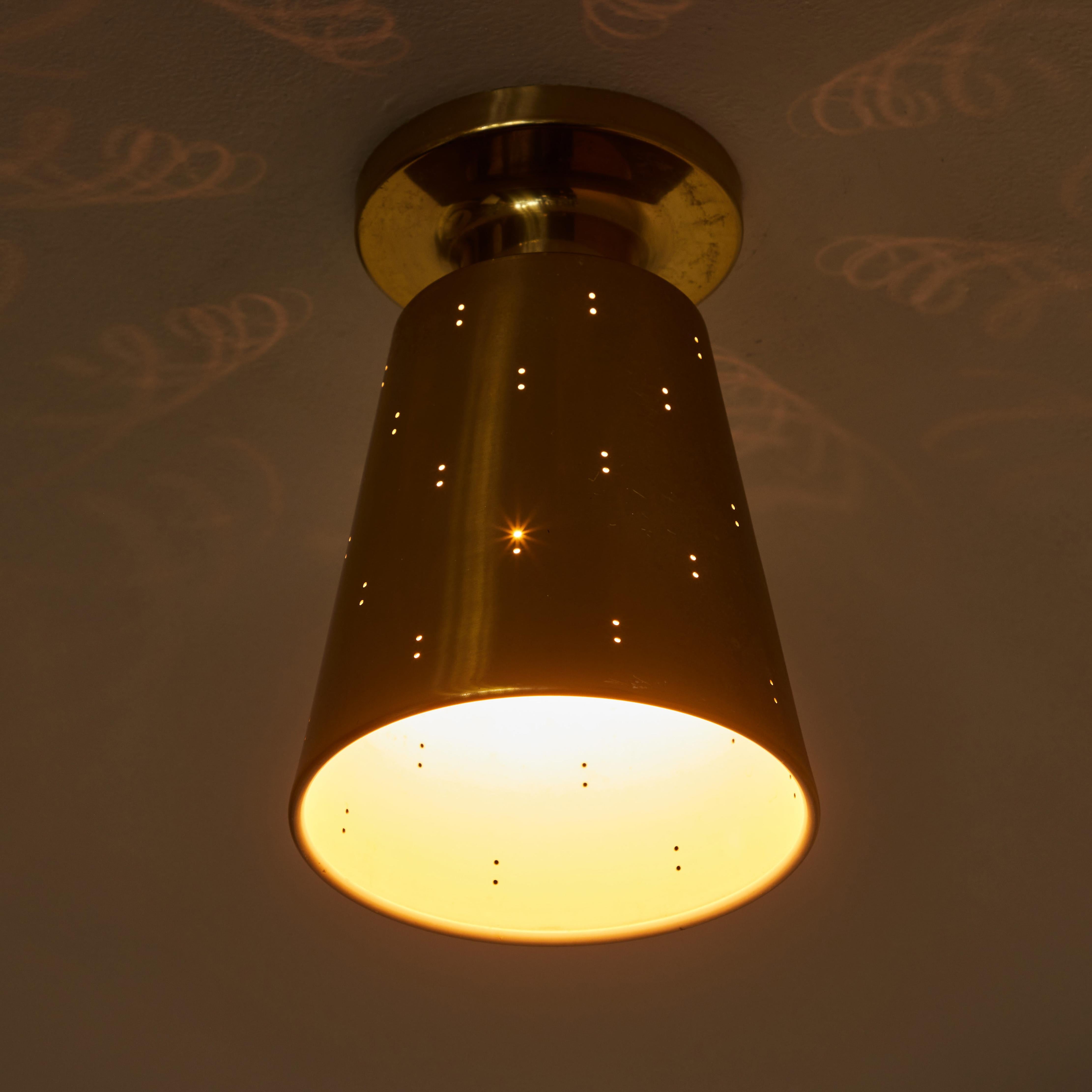 Finnish 1950s Perforated Brass Ceiling Lamp Attributed to Paavo Tynell For Sale