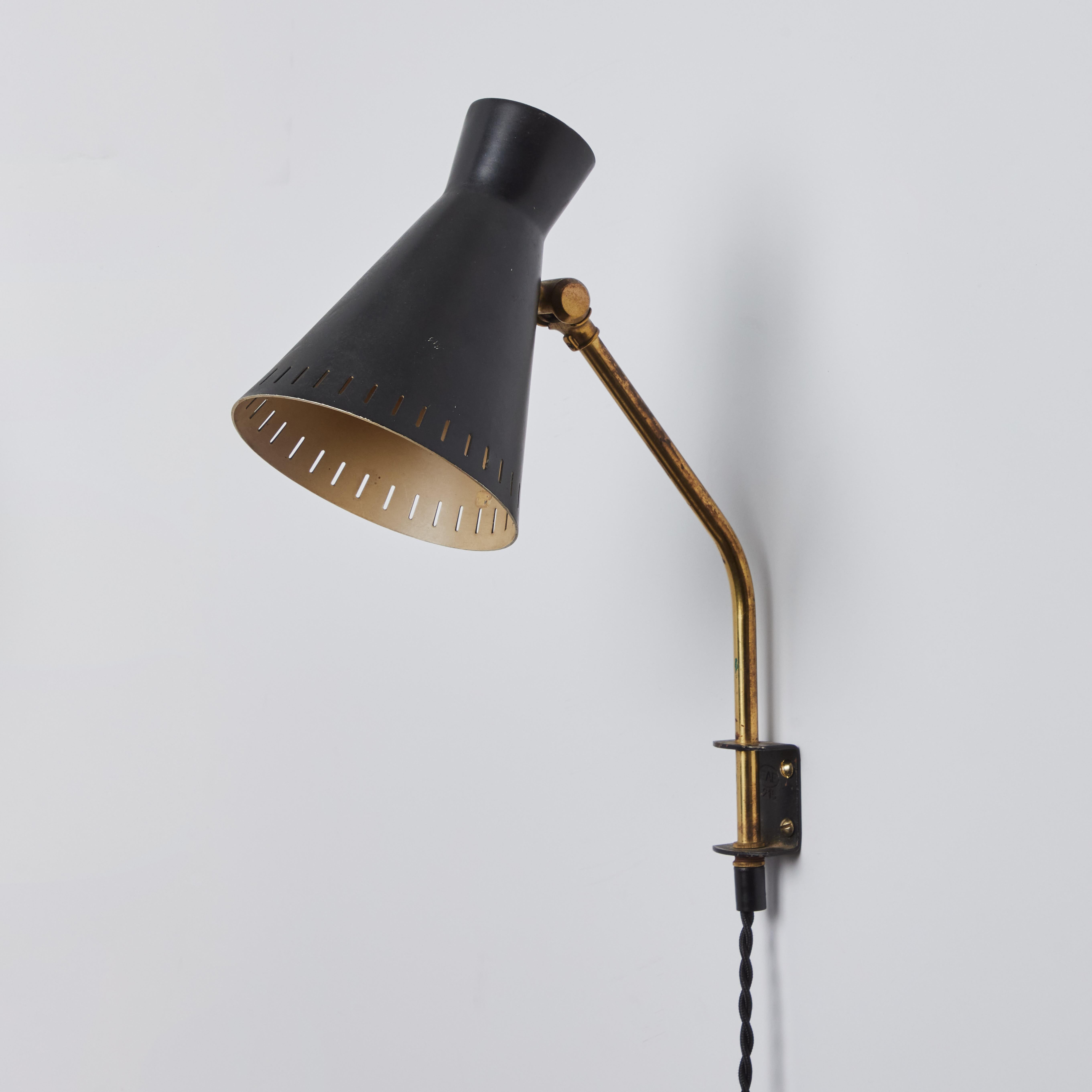 Scandinavian Modern 1950s Perforated Metal Diabolo Plug-In Wall Lamp Attributed to Mauri Almari For Sale