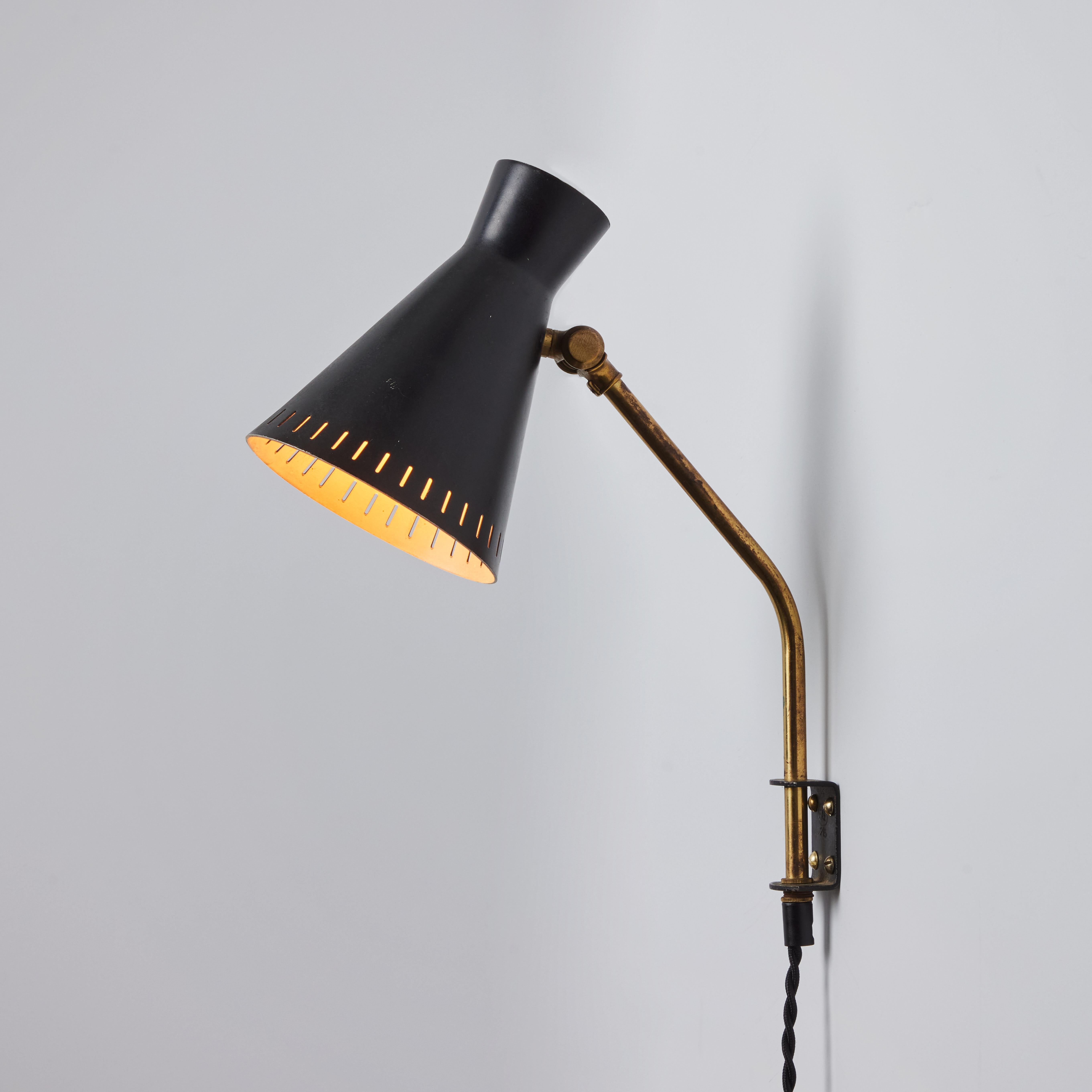 Mid-20th Century 1950s Perforated Metal Diabolo Plug-In Wall Lamp Attributed to Mauri Almari For Sale