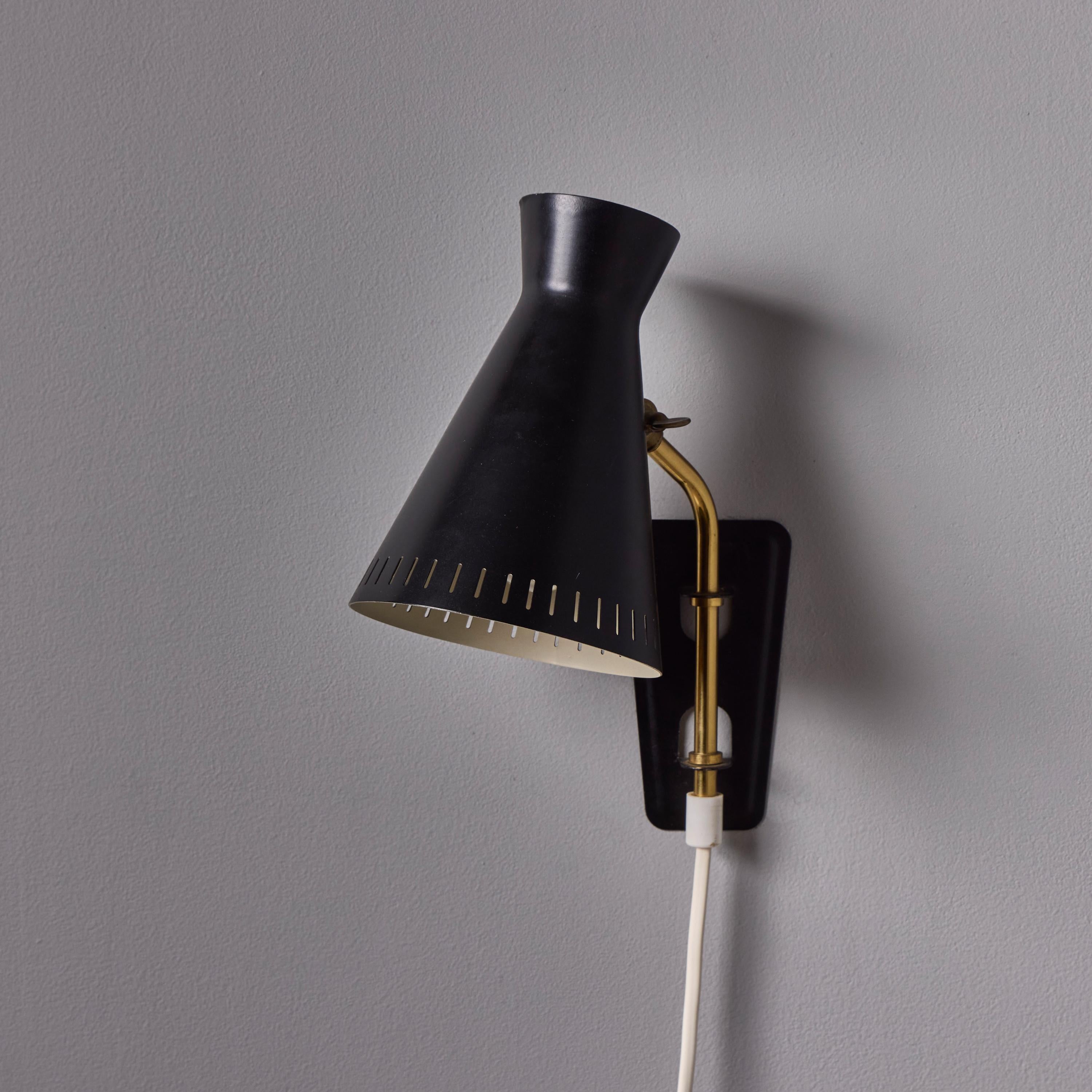 Milieu du XXe siècle 1950s Perforated Metal Diabolo Plug-In Wall Lamp Attributed to Mauri Almari en vente