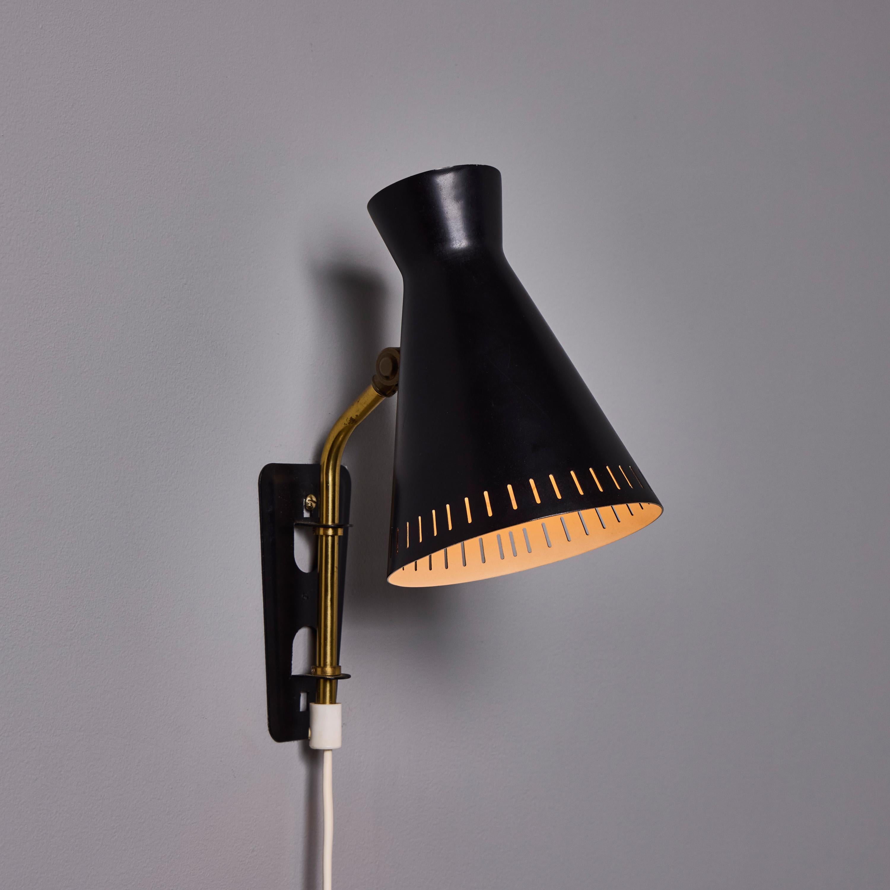 1950s Perforated Metal Diabolo Plug-In Wall Lamp Attributed to Mauri Almari en vente 1