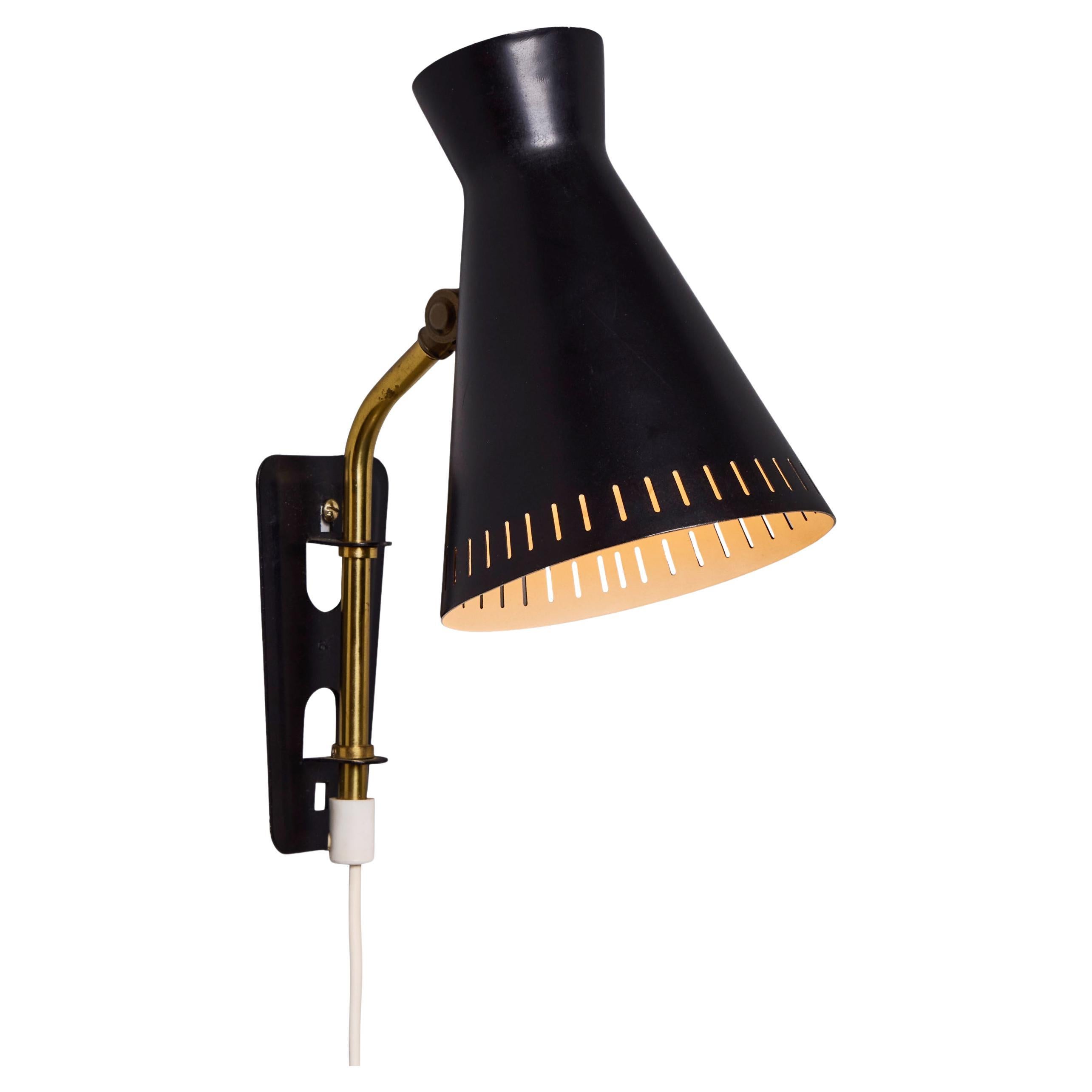 1950s Perforated Metal Diabolo Plug-In Wall Lamp Attributed to Mauri Almari