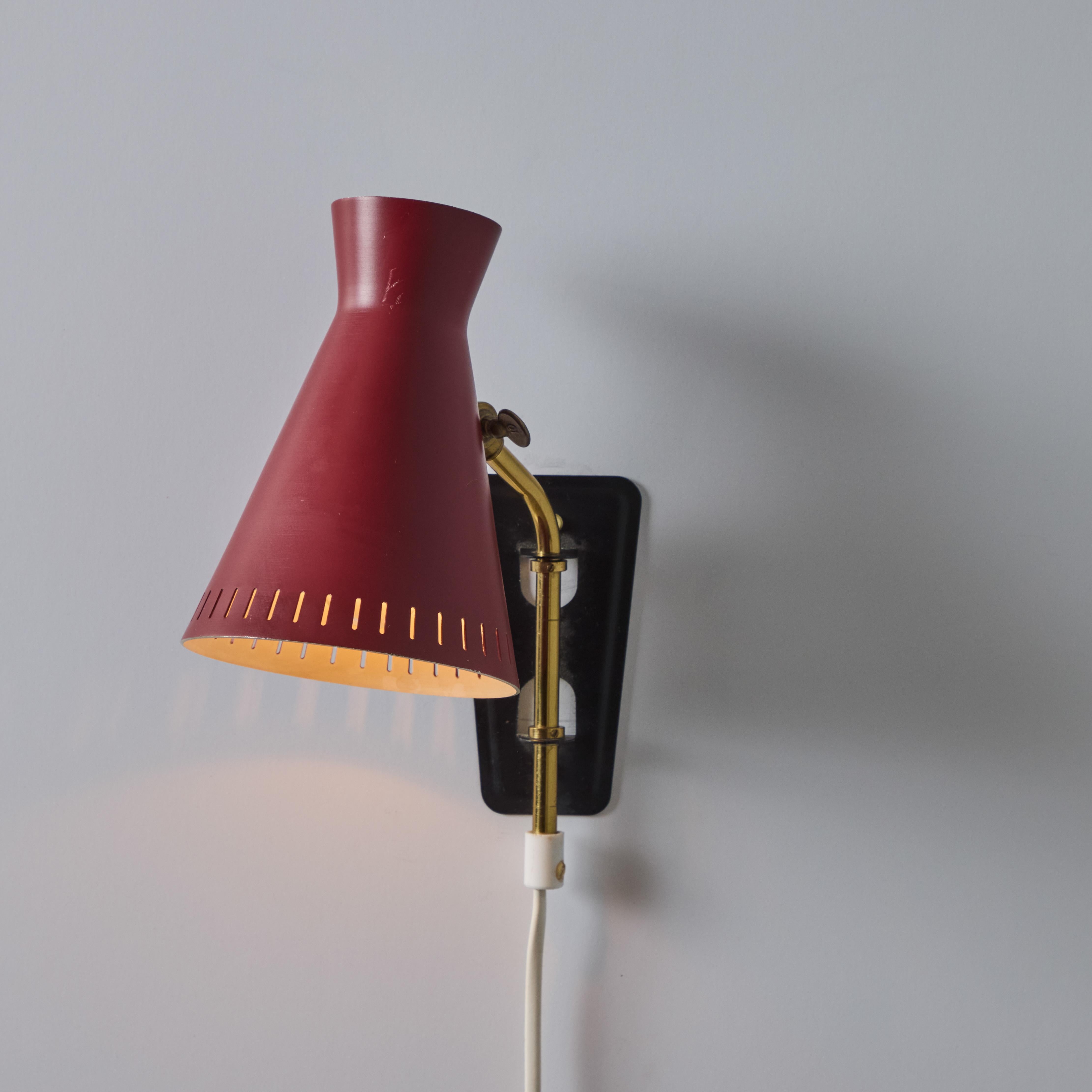 Mid-20th Century 1950s Perforated Red Diabolo Plug-In Wall Lamp Attributed to Mauri Almari For Sale