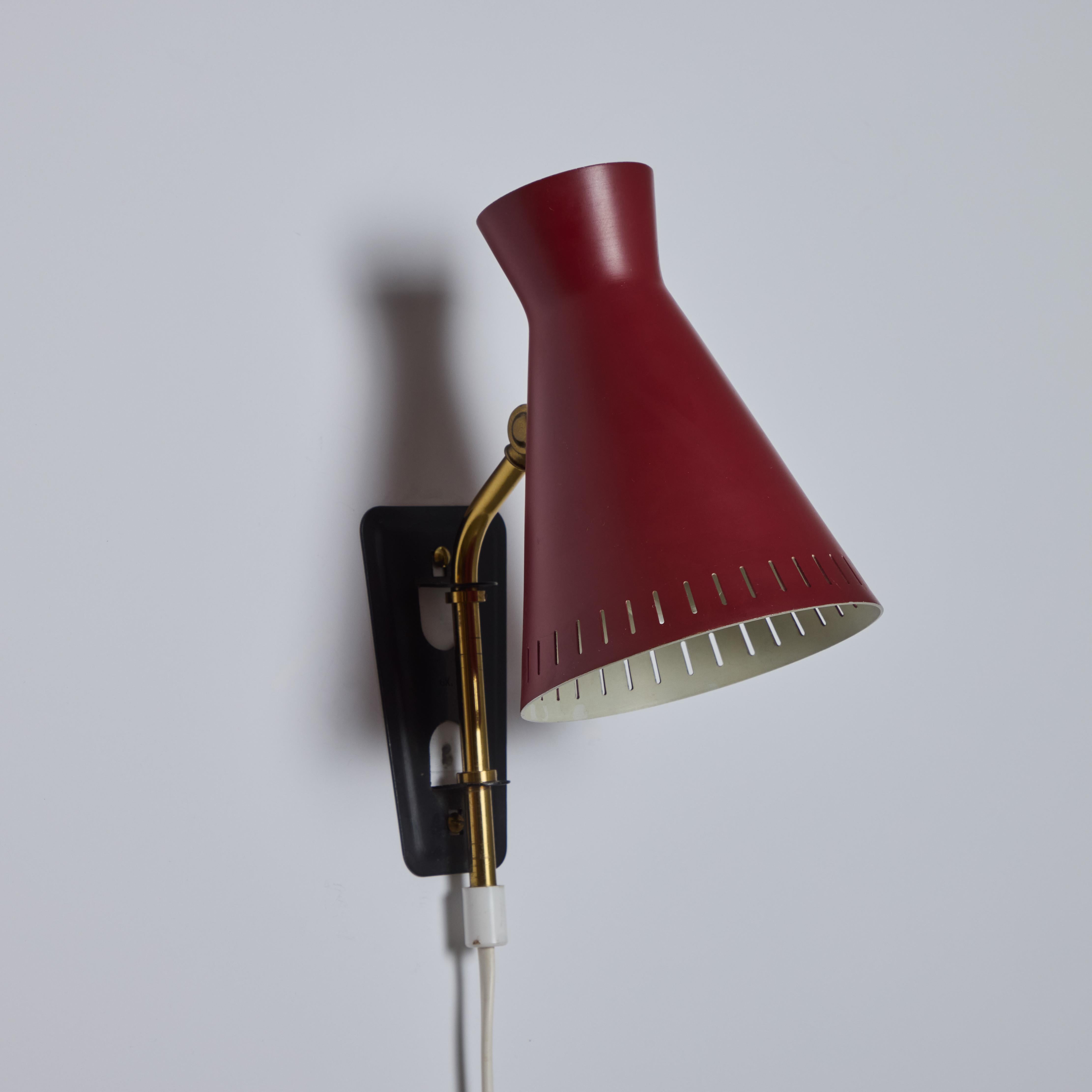 1950s Perforated Red Diabolo Plug-In Wall Lamp Attributed to Mauri Almari For Sale 1