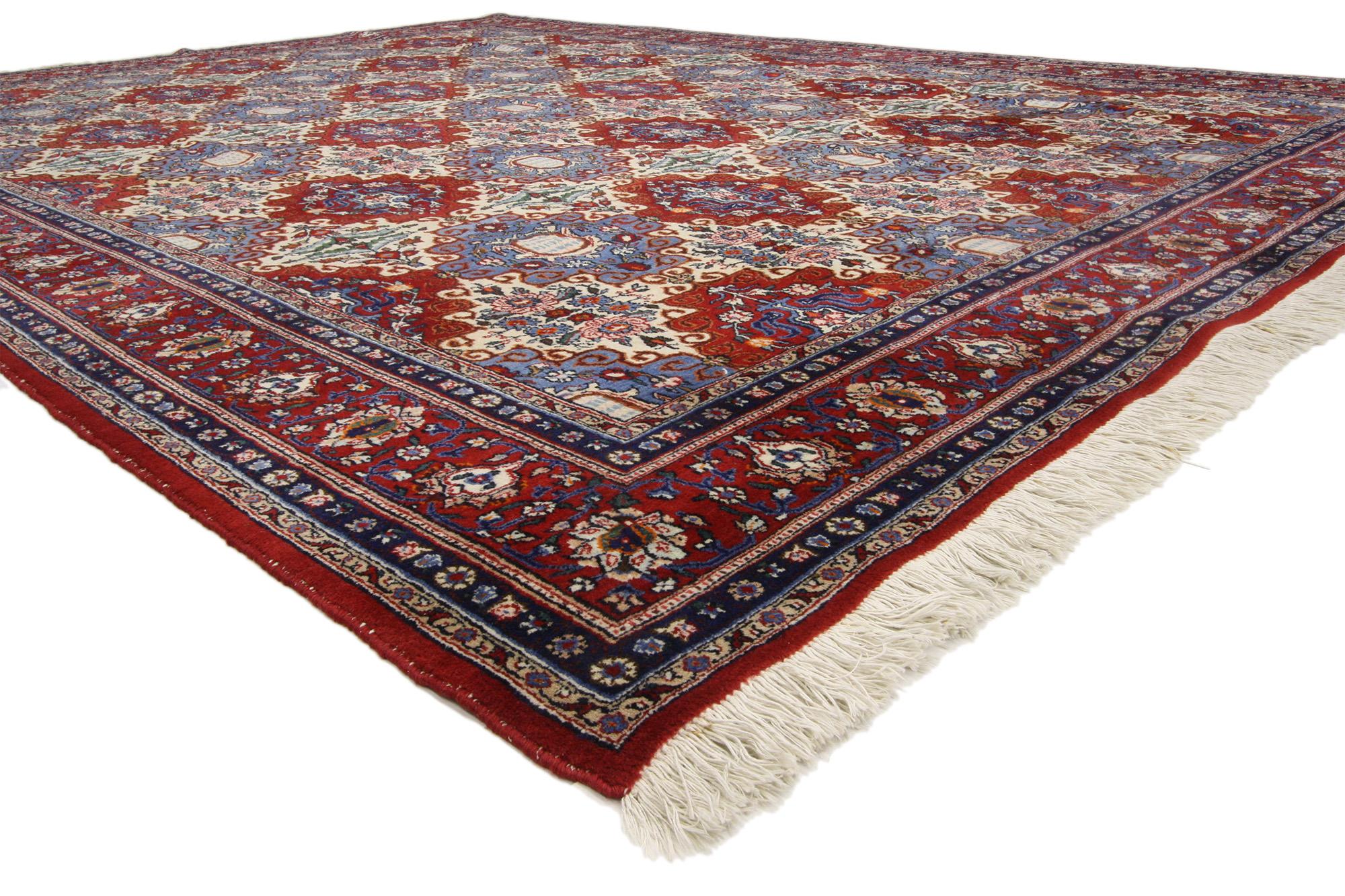 76779 Vintage Persian Moud Mood Rug, 09'06 x 12'07. This hand-knotted wool vintage Persian Mood rug unfolds like a lyrical manuscript from the heart of Khorasan, where geometry and nature intertwine in a refined harmony of form and color. The field