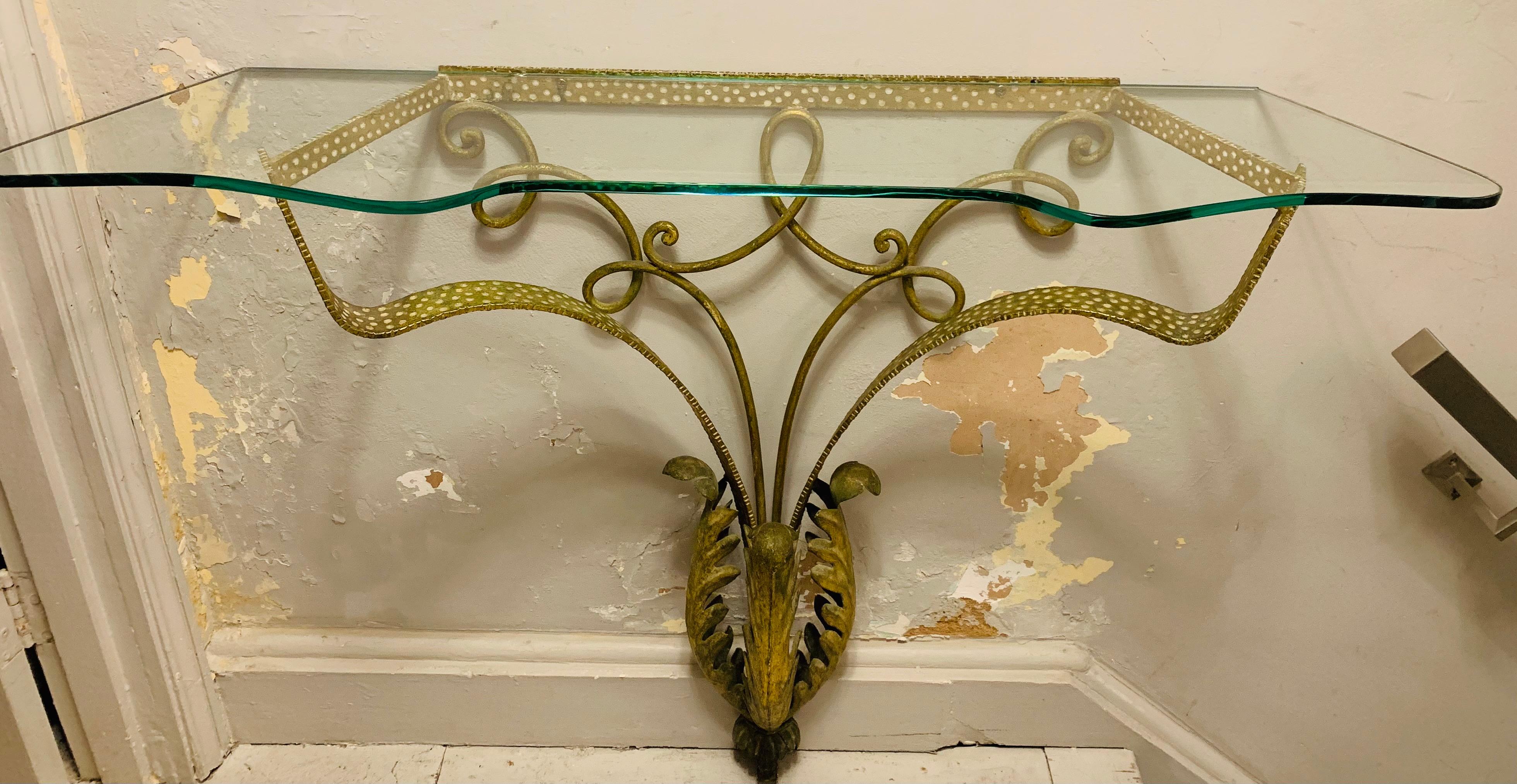 A striking and highly decorative 1950s, Italian, Pier Luigi Colli, gold with white spotted detail, wrought iron, wall mounted, console table. The fun white spotted outer frame is accented with scrolled iron detailed metal work. The slim base