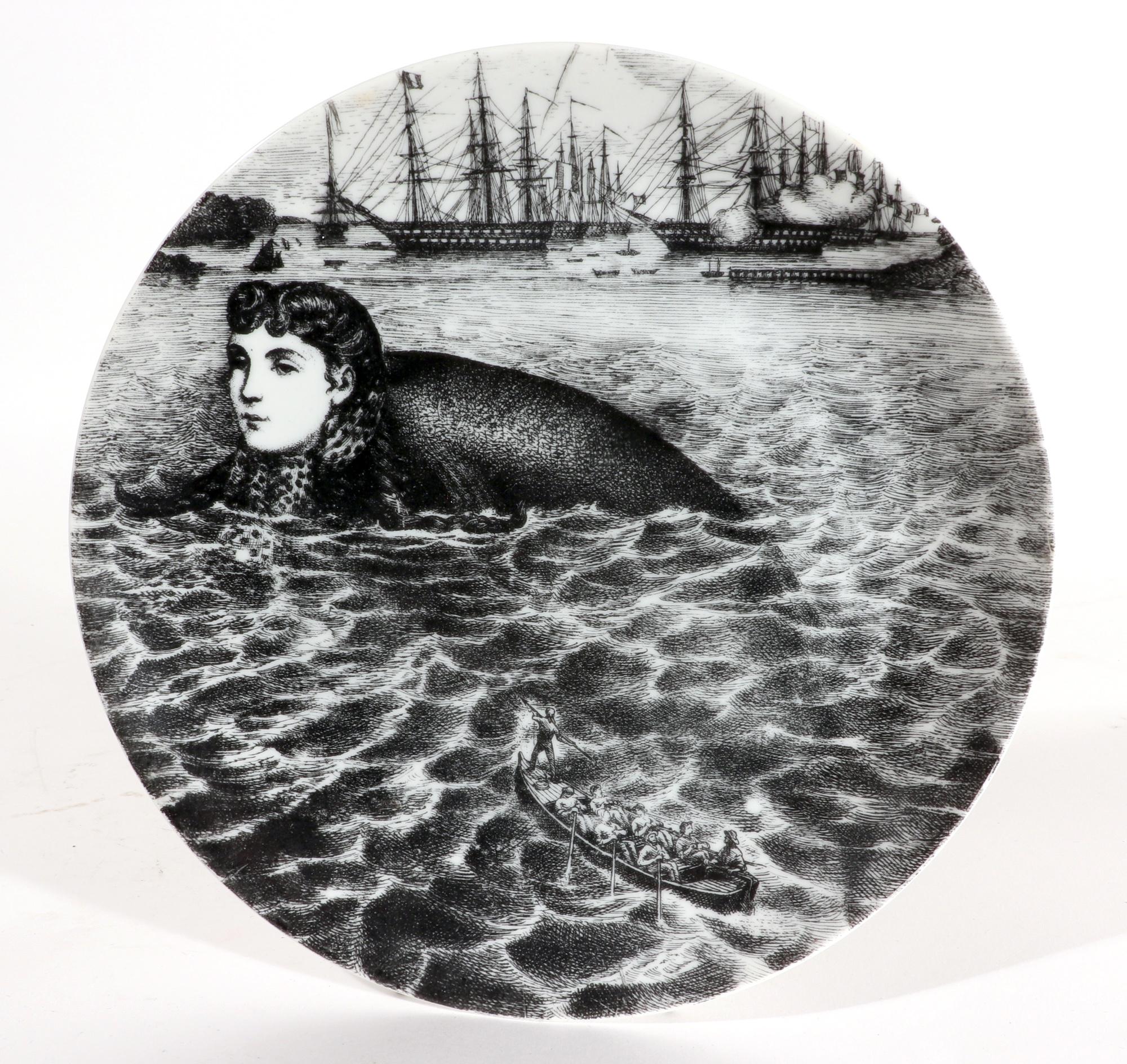 Piero Fornasetti Porcelain Plate, 
Sirene Pattern (Sirens), #2,
Early 1950s

The Piero Fornasetti black and white plate from the early and rare Sirens pattern. This depicts a giant sea creature with a female head amongst waves. In the background