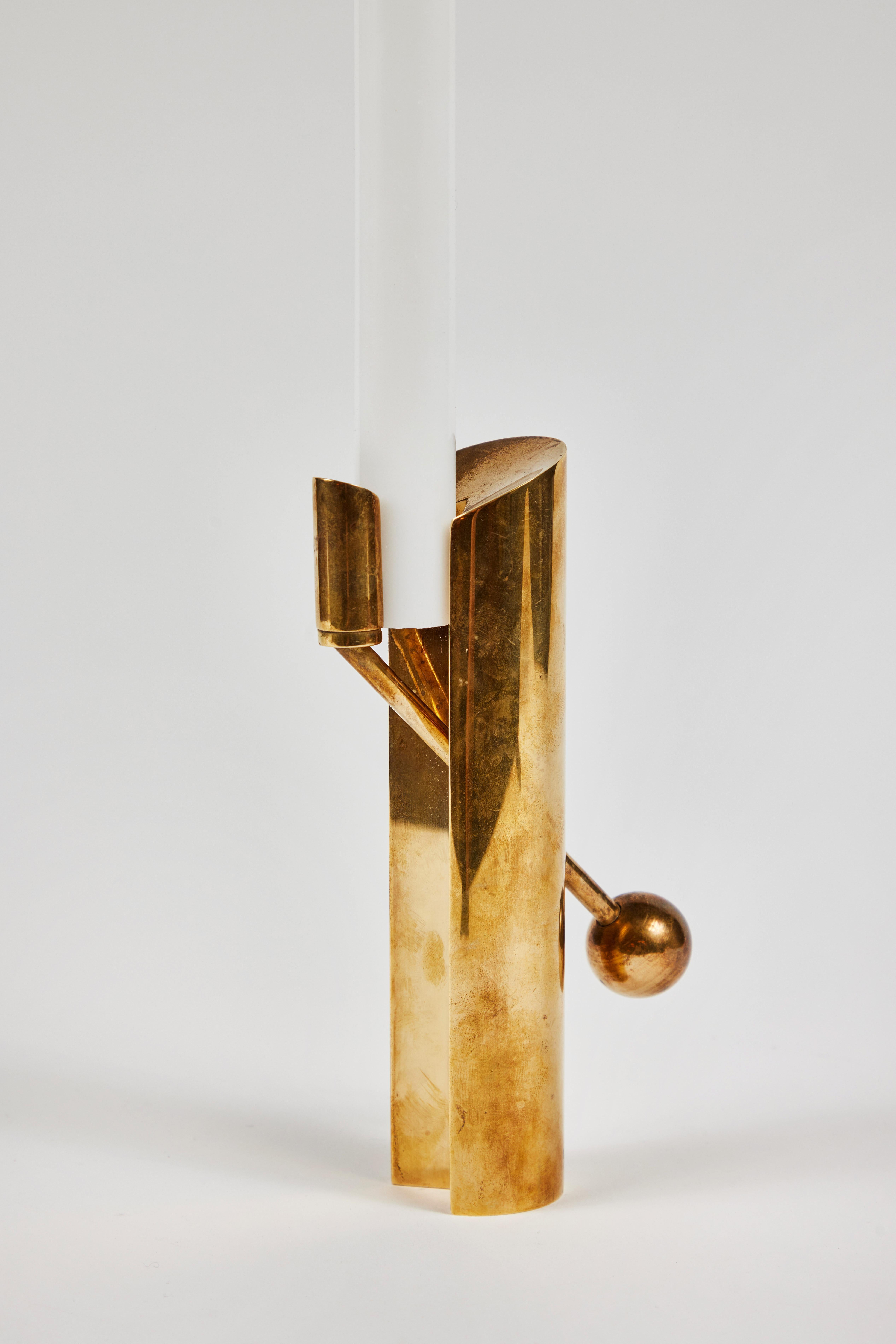 1950s Pierre Forsell Model #1607 brass candleholder for Skultuna. 

Executed in solid brass, this exquisitely refined and versatile sculptural candleholder is rightly celebrated as one of Forsell's most iconic Swedish designs. One bears original