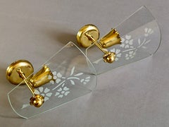 1950s Pietro Chiesa style wall lamps. Brass and decorated lampshades. A pair.