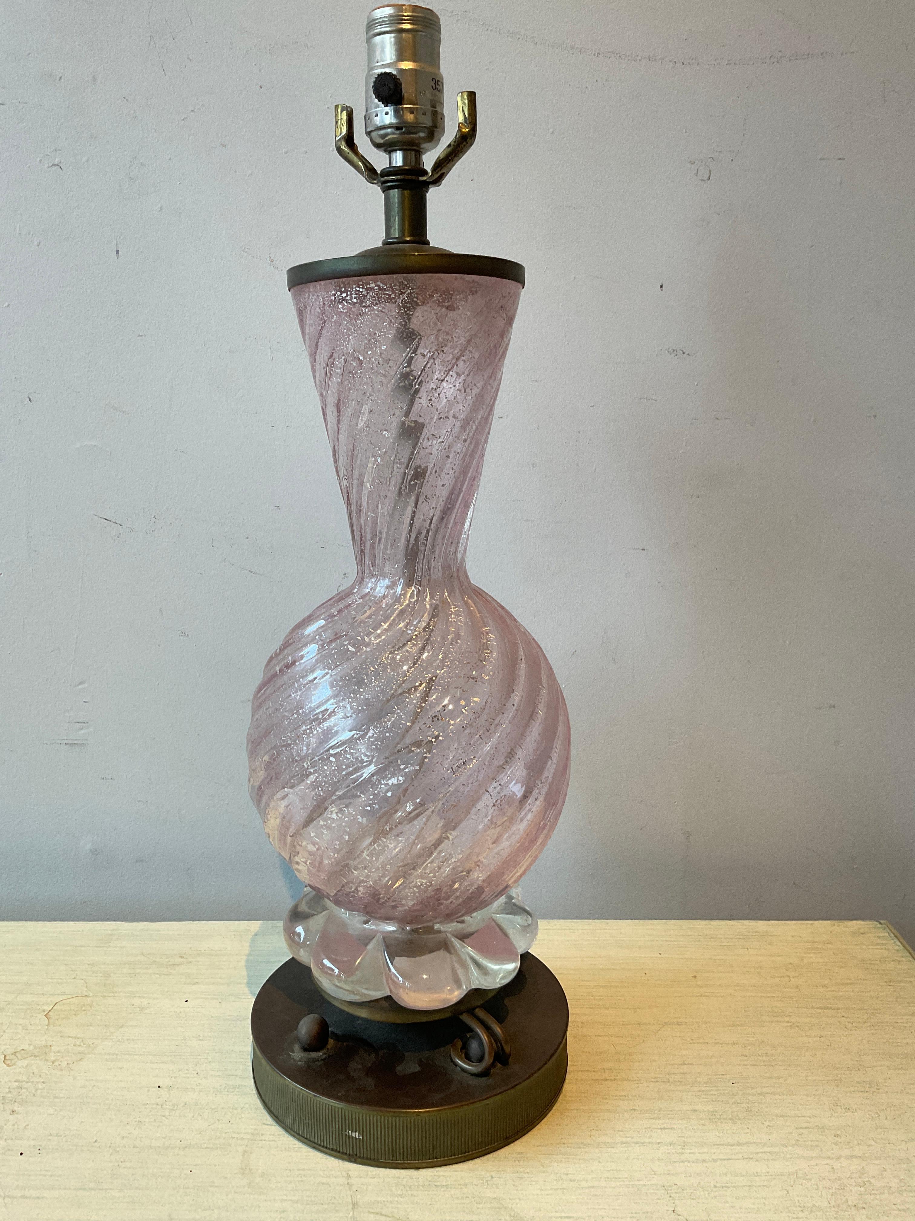 1950s Pink Murano glass lamp on brass base with brass cap. Lamp needs rewiring.
Piece is missing on base as shown in last picture.
Height is to top of socket.